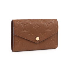 LOUIS VUITTON 2013 "Curieuse" Havane Empreinte Leather Trifold Compact Wallet