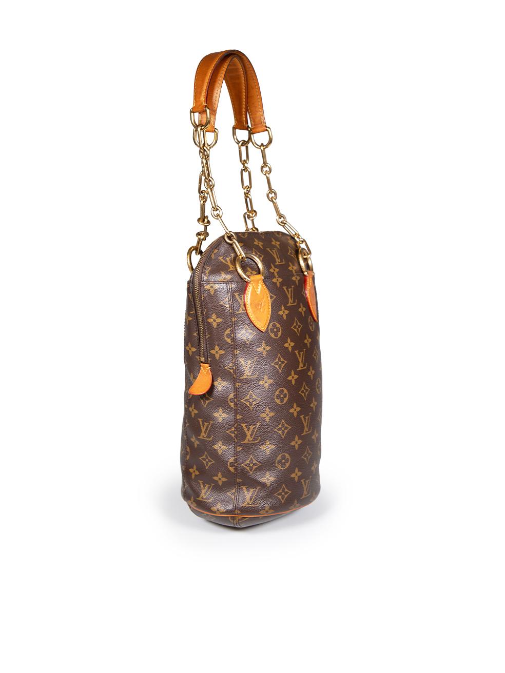 CONDITION is Good. Minor wear to bag is evident. Light signs of wear to all four handle tabs with discolouration and the back two tabs with scratches. Tarnishing on the metal zip and a stitch has come undone on one handle. The coating has cracked on