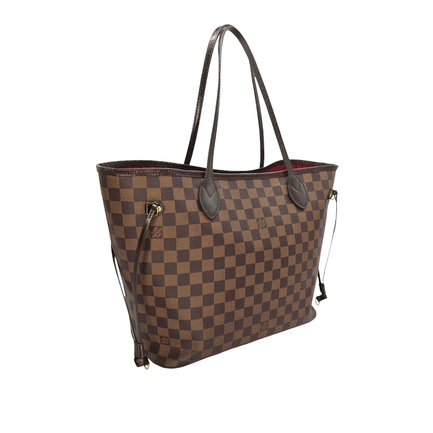 Indulge in luxury with the Louis Vuitton Damier Ebene Neverfull MM w/ Pouch. Exquisitely crafted in 2016, this USA-made tote features the iconic Damier Ebene coated canvas with leather trimming and gold-tone hardware. The spacious interior is lined
