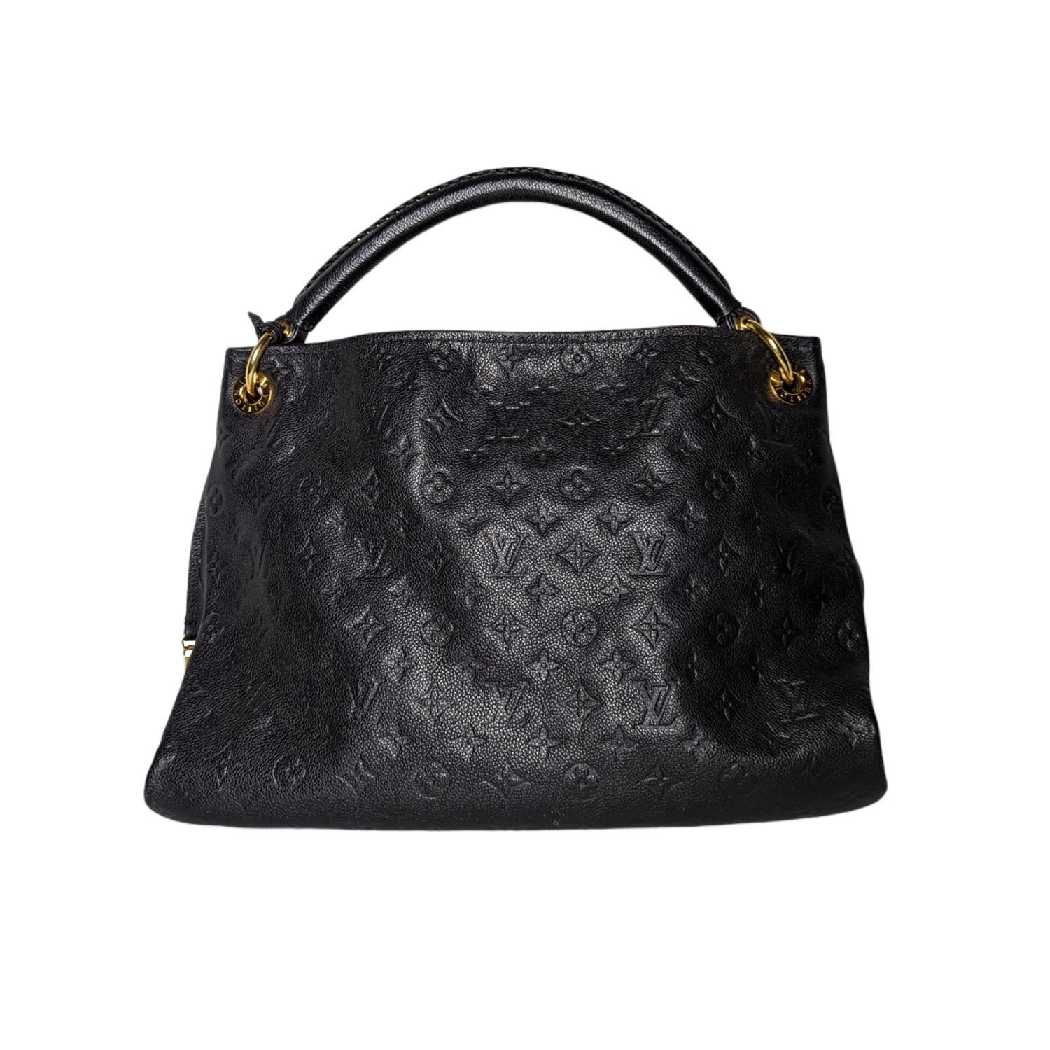 The Artsy handbag delights with its refined craftsmanship and functional features. Fashioned from supple Monogram Empreinte embossed leather, this quietly luxurious hobo features a handmade, cross-stitched handle that slips easily over the shoulder.