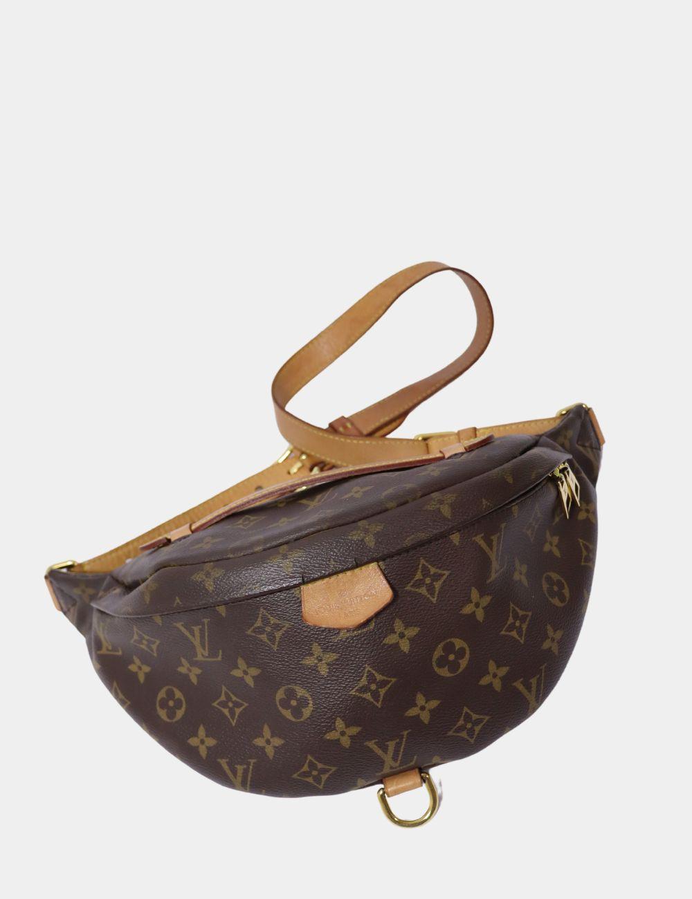Louis Vuitton 2020 Monogram Bum Bag, Features a cowhide leather top handle, adjustable waist strap, exterior zipper pocket, and zip closure.

Material: Leather and Coated Canvas
Hardware: Gold
Height: 18cm
Width: 29cm
Depth: 11cm
Overall condition: