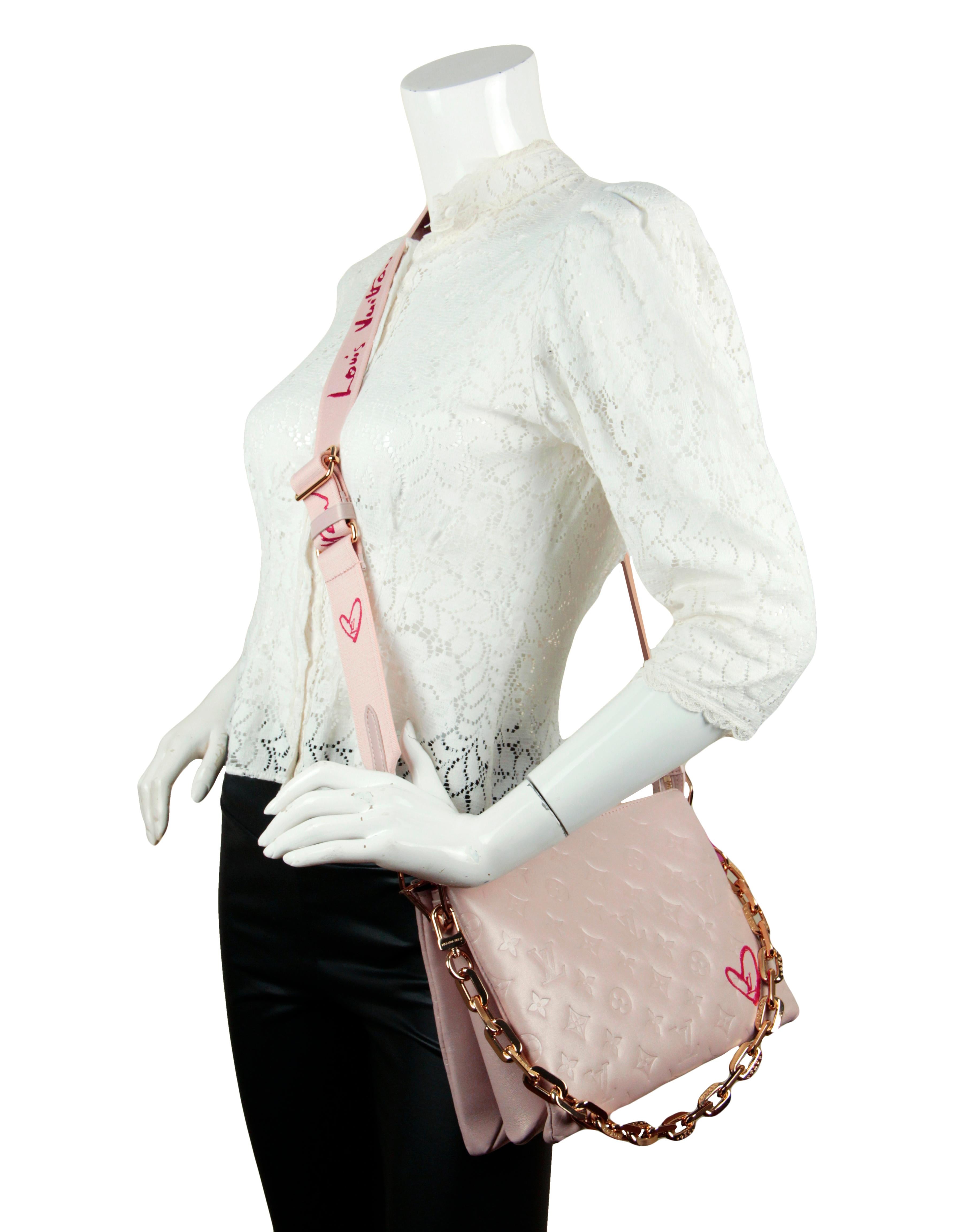 Louis Vuitton Limited Edition Metallic Dragee Pink Lambskin Embossed Monogram Fall In Love Heart Coussin PM.  Features adjustable canvas strap allowing for crossbody or shoulder carry, and chain strap for baguette and under-arm carry.
Made In: