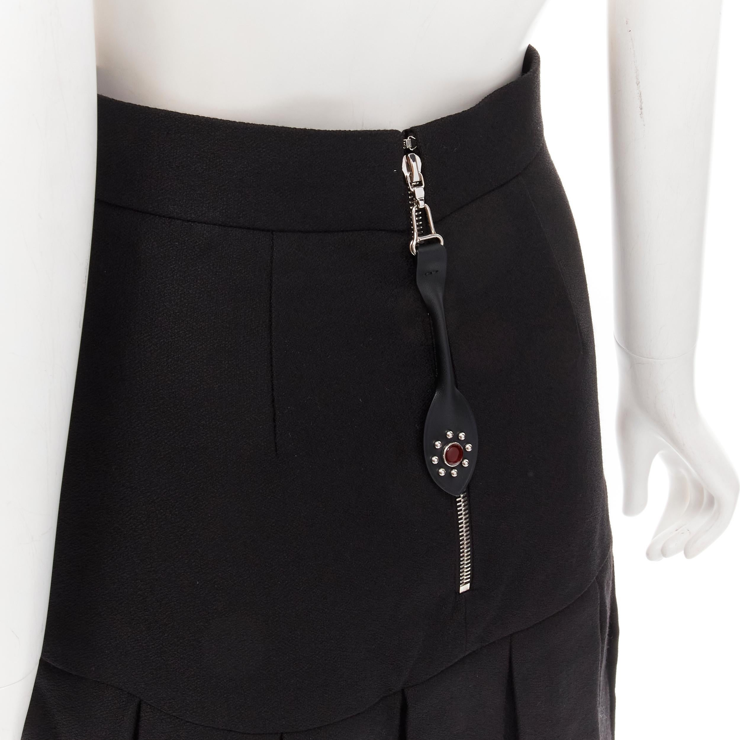 LOUIS VUITTON 2021 Runway black wool silk crepe fringe flapper skirt FR34 XS
Brand: Louis Vuitton
Designer: Nicolas Ghesquiere
Collection: 2021 
Material: Wool
Color: Black
Pattern: Solid
Closure: Zip
Extra Detail: Red jewel rhinestone studded