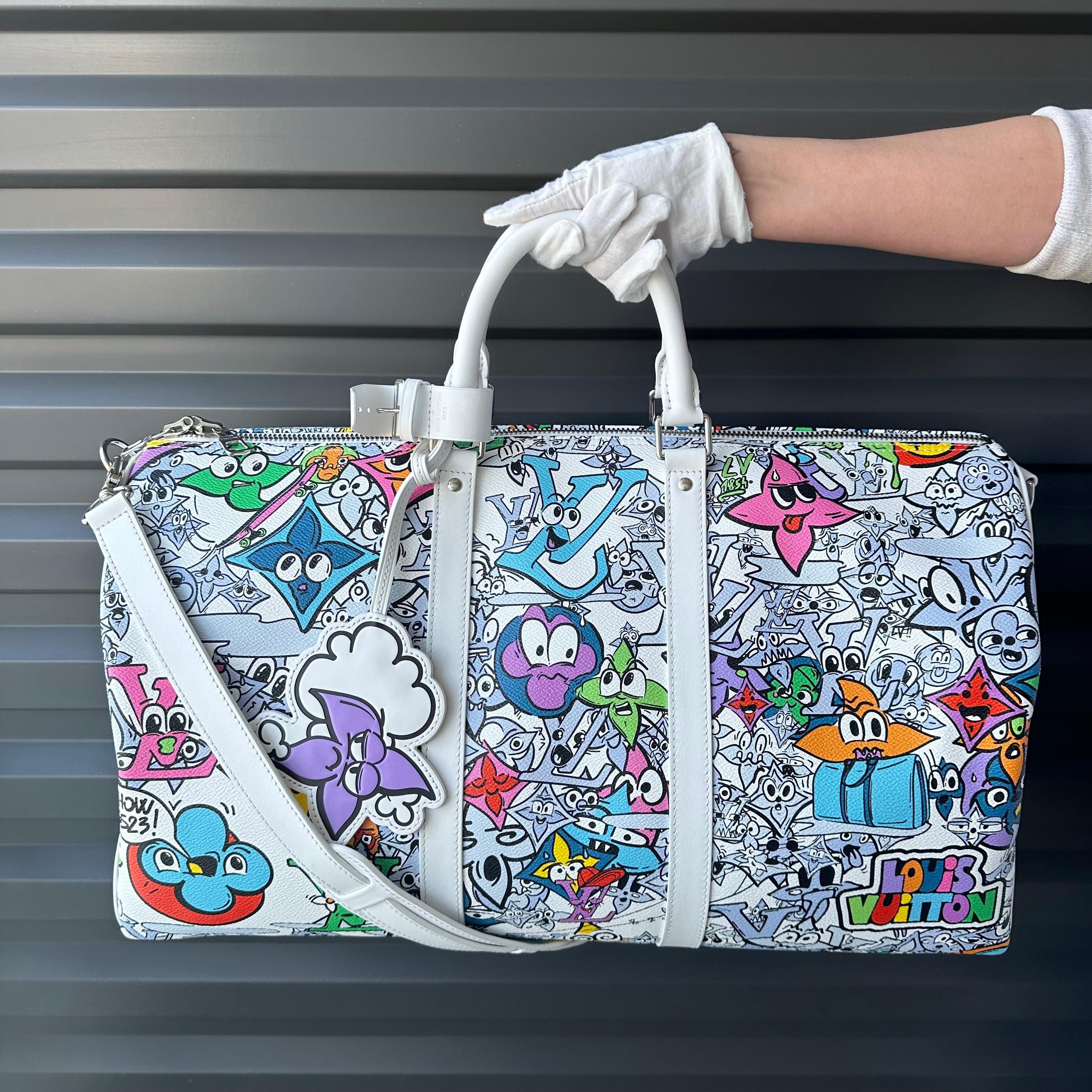 LOUIS VUITTON 2023 Comics White & Multi-Color Monogram Keepall Bandouliere 50 For Sale 1