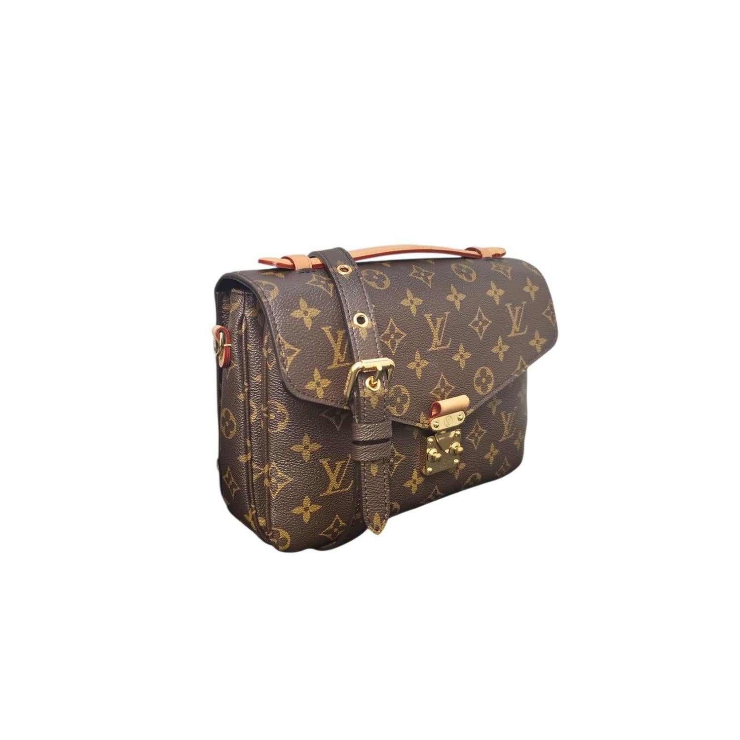 Diese verspielte Louis Vuitton Monogram Metis Pochette Messenger Bag glänzt mit klassisch beschichtetem Canvas und Rindslederbesätzen. Sie wird 2023 in den USA hergestellt und verfügt über ein sicheres S-Schloss mit goldfarbenen Beschlägen und ein