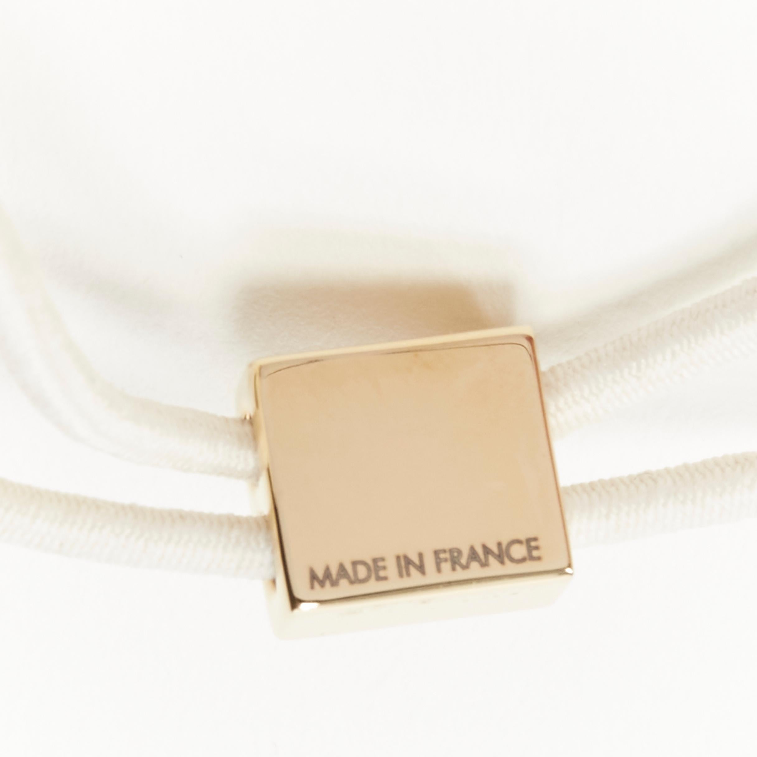 Women's LOUIS VUITTON 2X gold tone LV monogram floral charm hair cube white brown