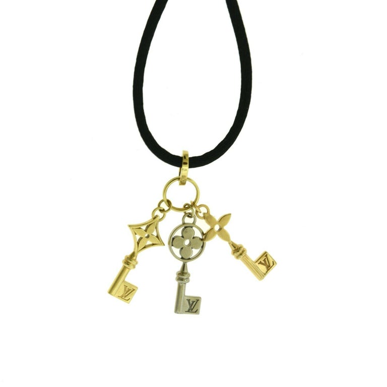 Louis Vuitton 3 Key Tri Gold 18k Yellow, Rose, and White Gold Necklace,  Black Silk For Sale at 1stDibs