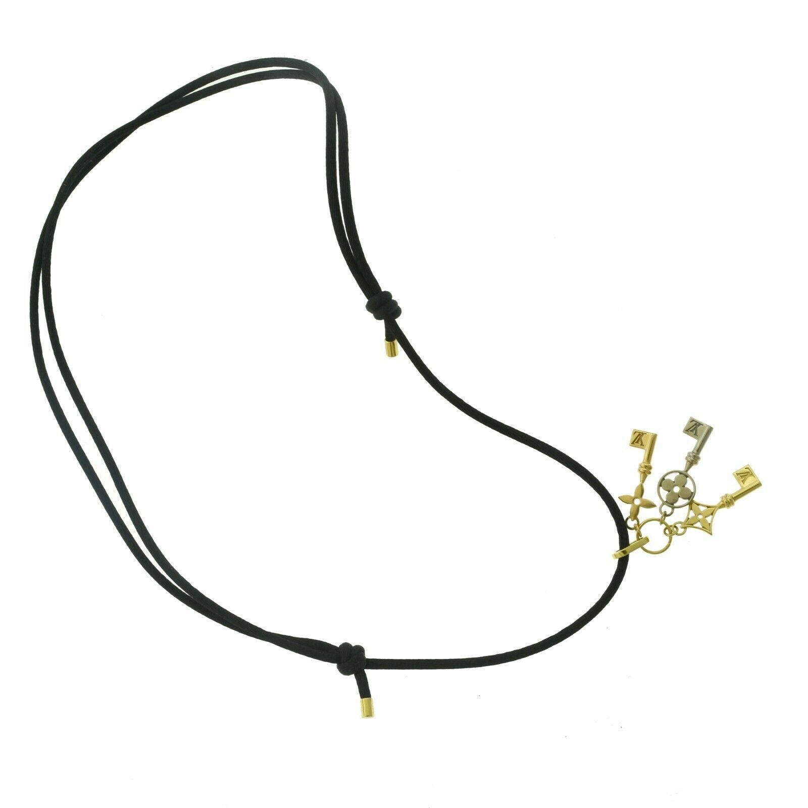 Louis Vuitton 3 Key Tri Gold 18k Yellow, Rose, & White Gold Necklace, Black Silk In Good Condition In Miami, FL
