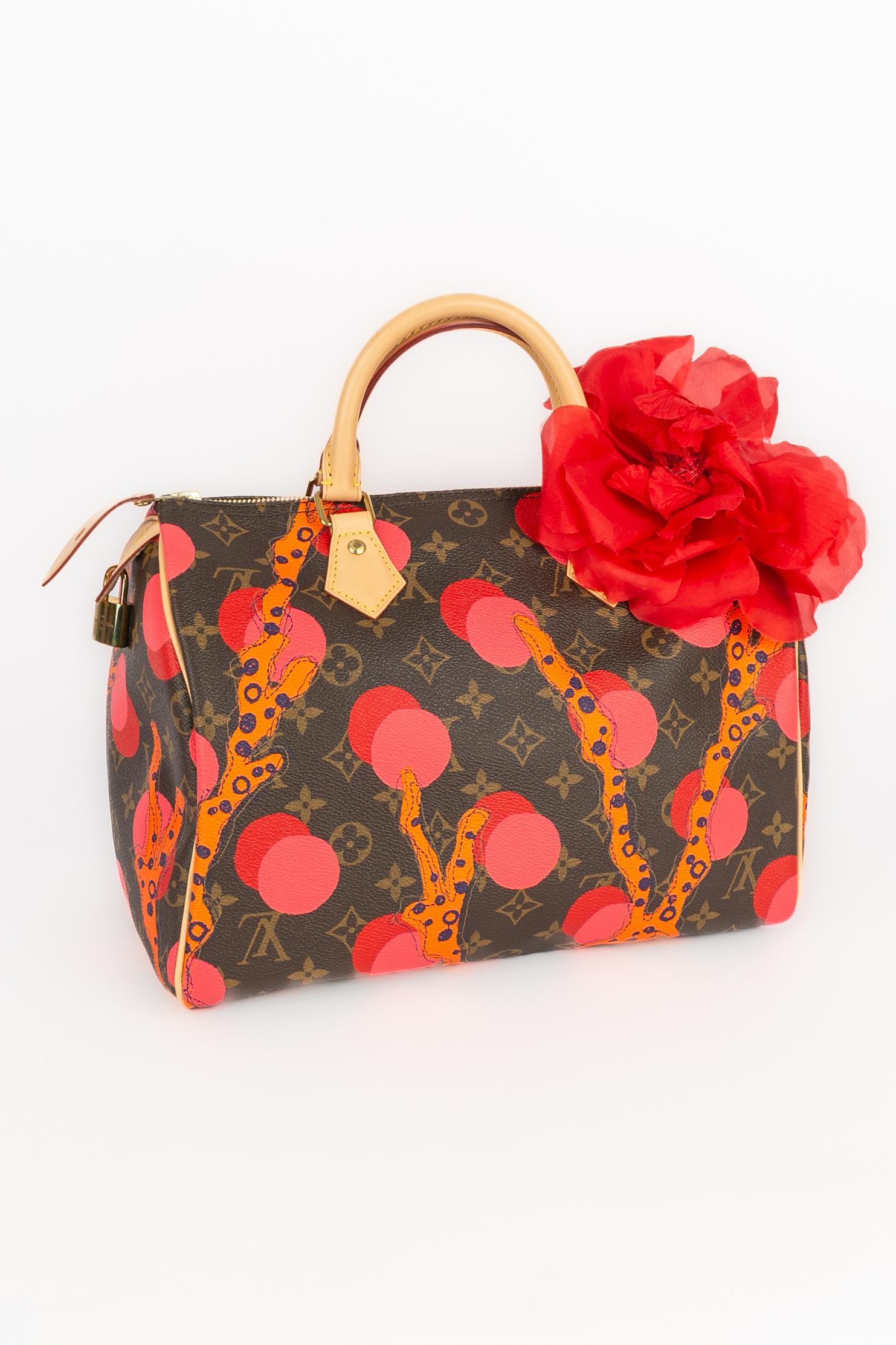 LOUIS VUITTON -(Made in France) 'Ramages' monogram coated canvas 30cm Speedy bag with natural leather, golden brass, a padlock and keys. A 2015 Collection - limited edition.

Condition:
Very good condition

Dimensions:
Length: 30 cm - Height: 23 cm