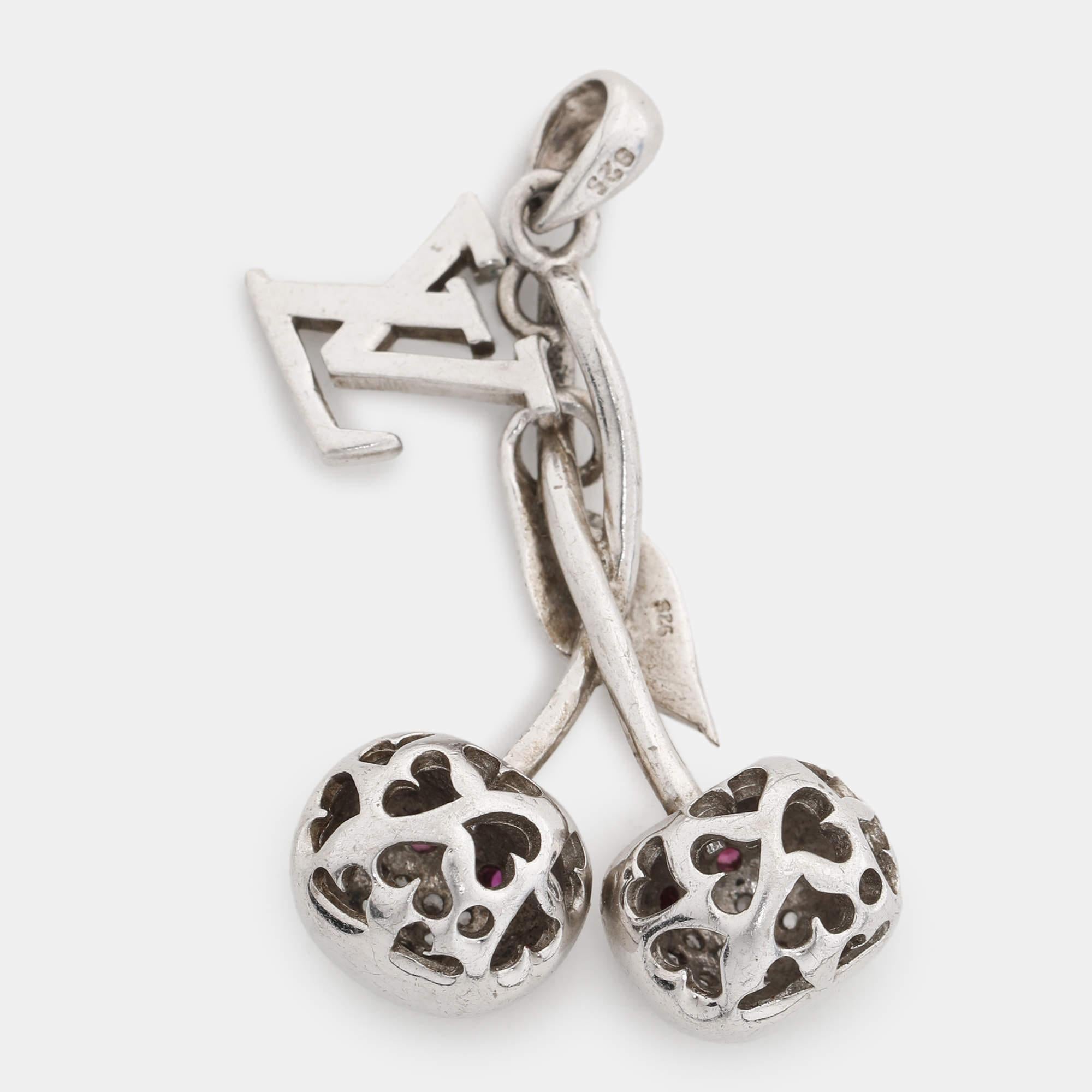 Adorning our most worn bags is a hobby all handbag lovers can resonate with. Louis Vuitton understands that all too well and hence creates beautiful charms that are fun and delightful to see. This cute LV Cherry Blossom bag charm is one such