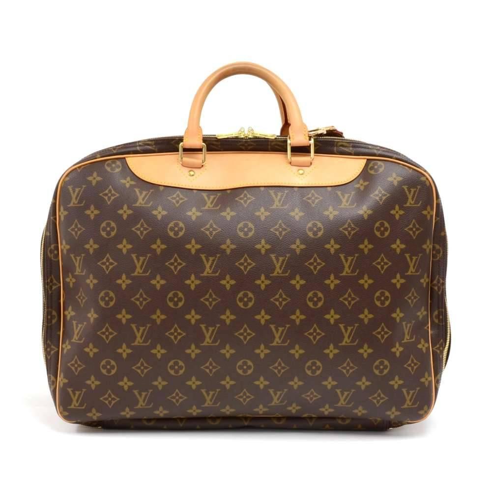 Louis Vuitton Alize 24 Heures travel bag. The front has a large slip pocket. It has 2 separated compartments both secured with double zippers. Each compartment has a large slip pocket and washable lining. Perfect size for short trips combines the