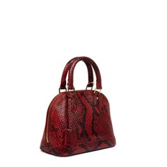 LOUIS VUITTON, Alma BB in red exotic leather