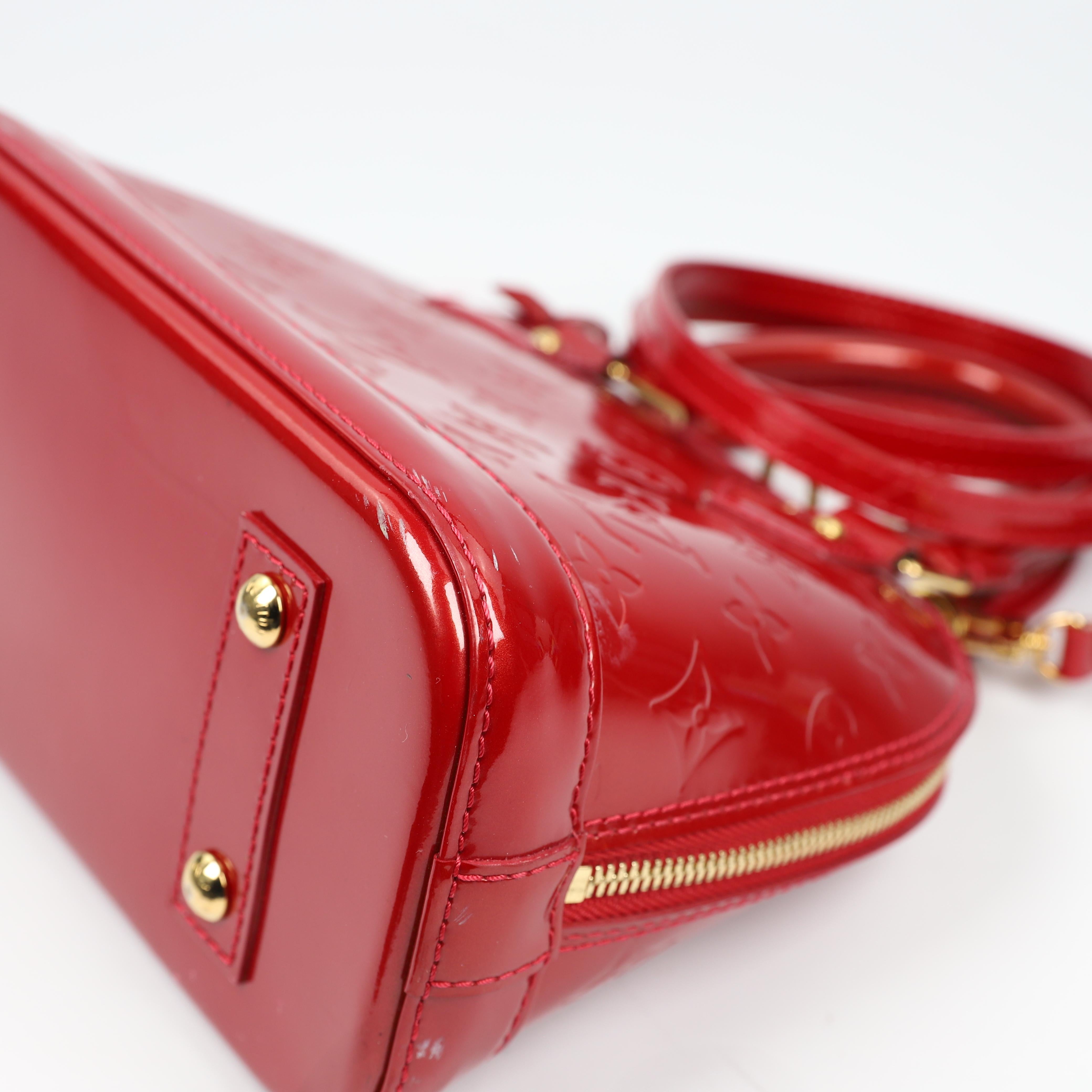 Louis Vuitton Alma BB leather handbag 6