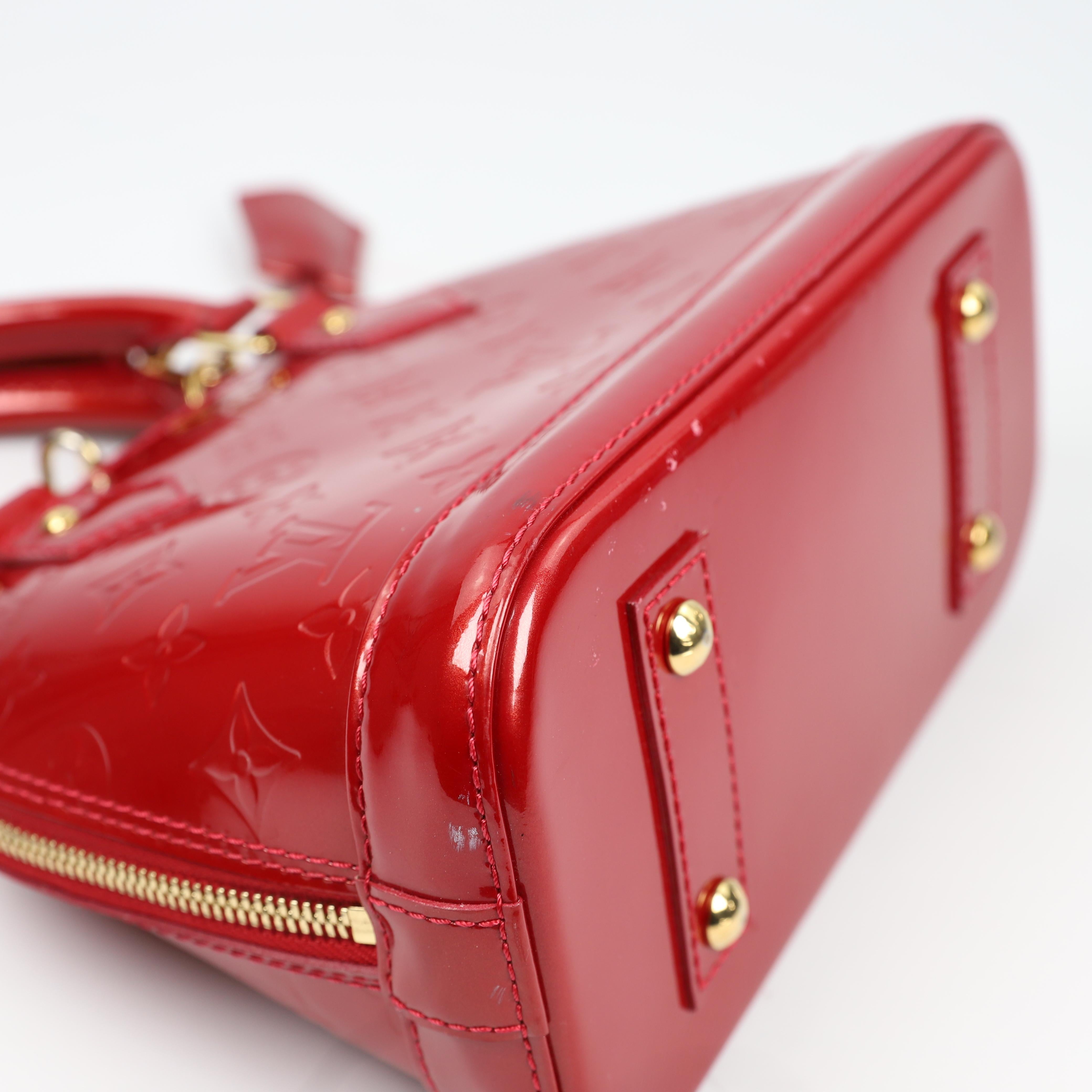 Louis Vuitton Alma BB leather handbag 7