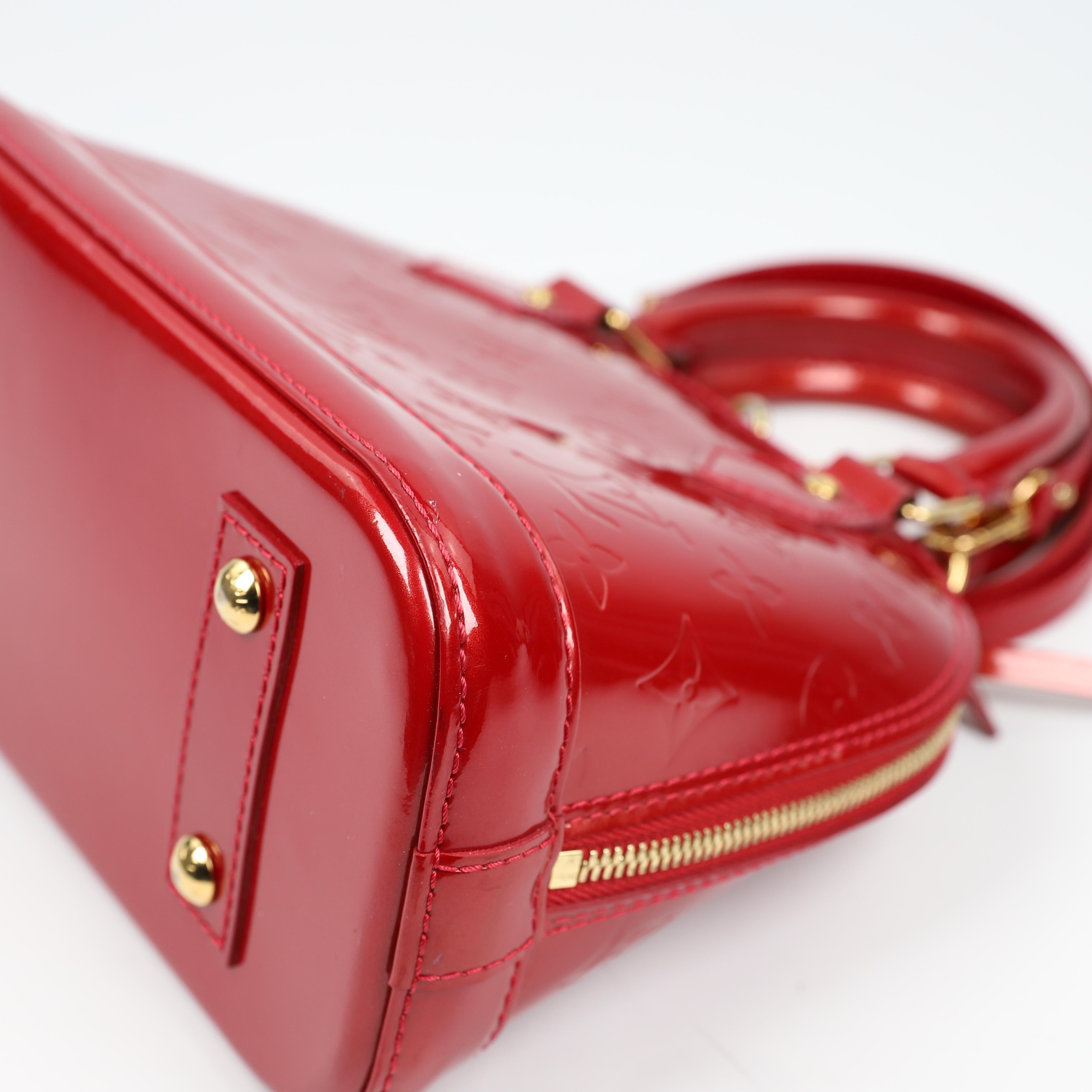 Louis Vuitton Alma BB leather handbag 8