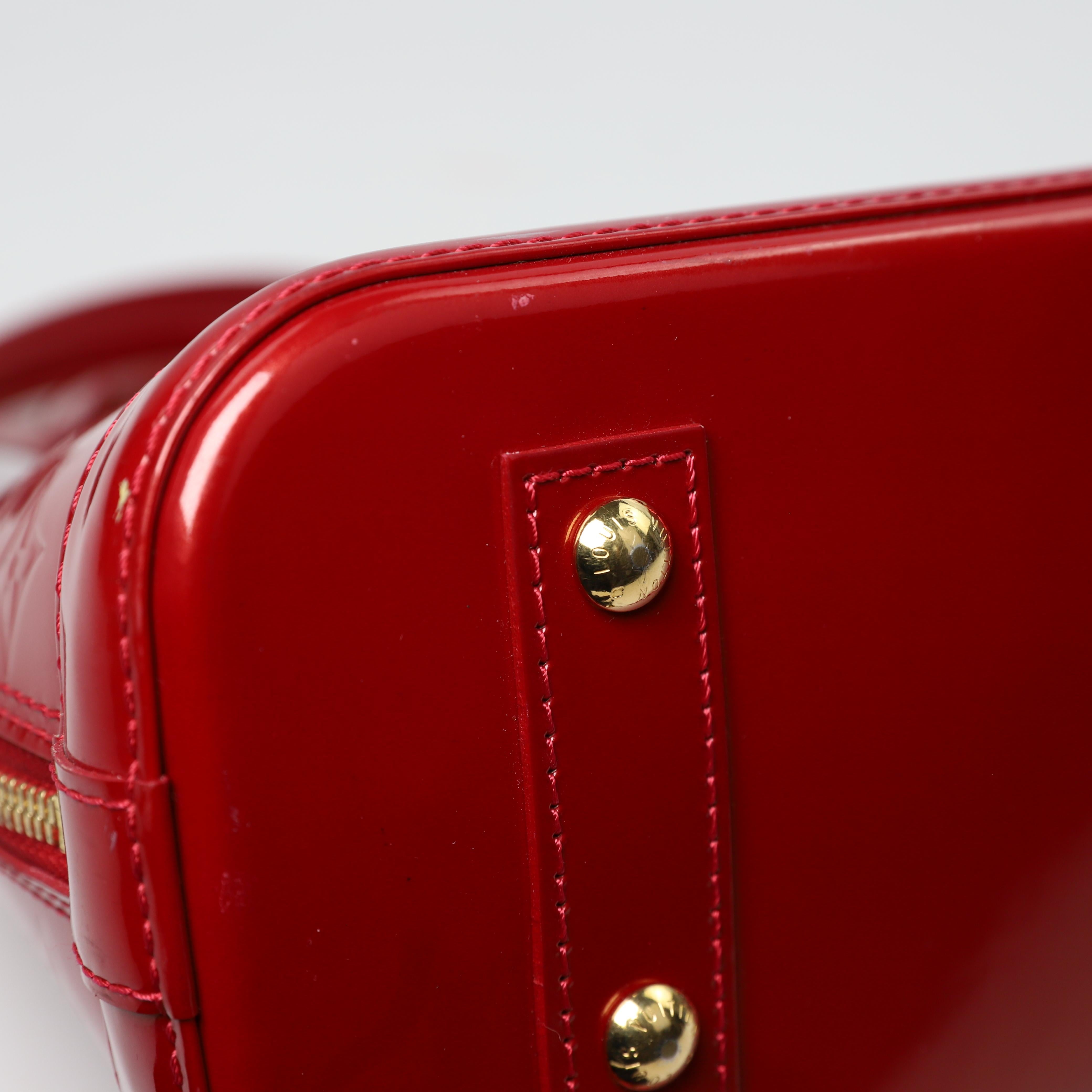 Louis Vuitton Alma BB leather handbag 9