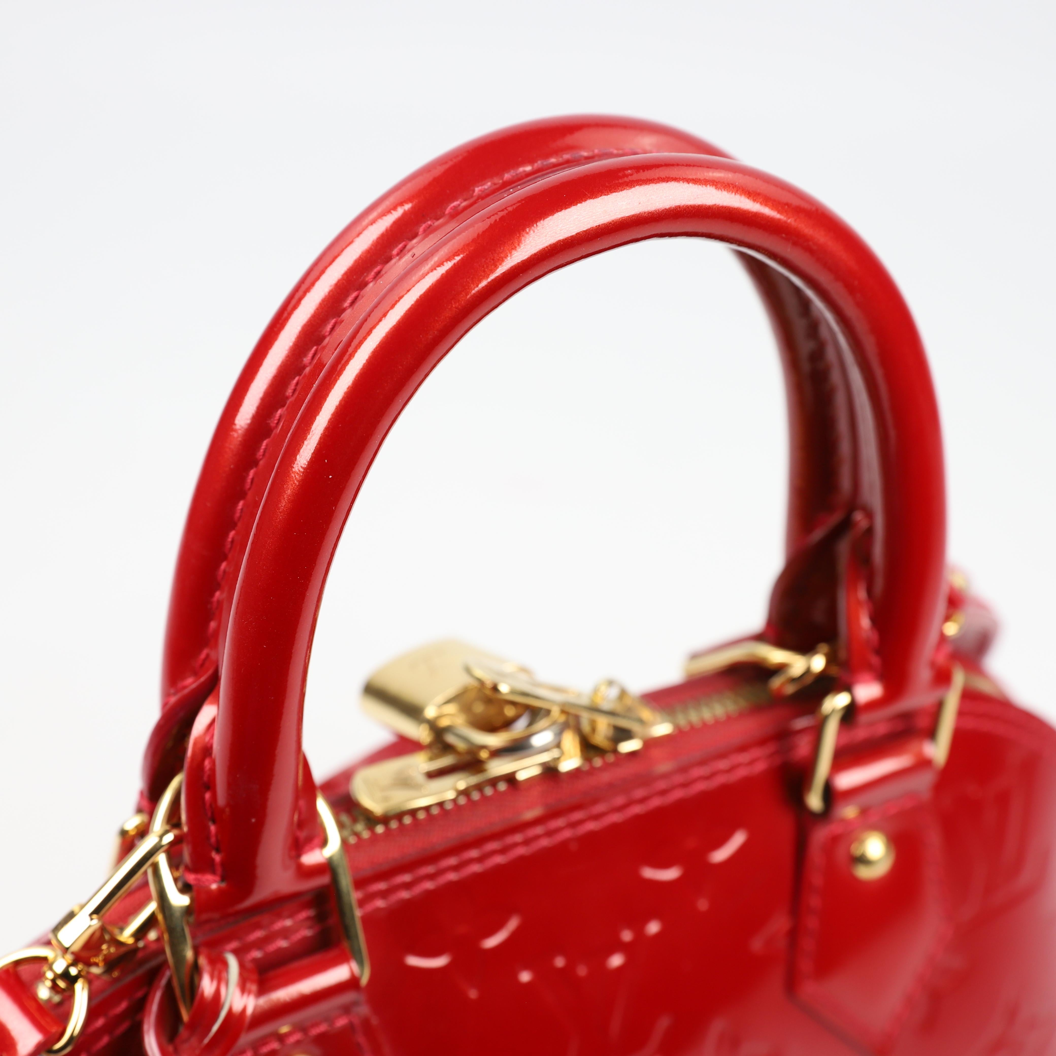 Louis Vuitton Alma BB leather handbag 10