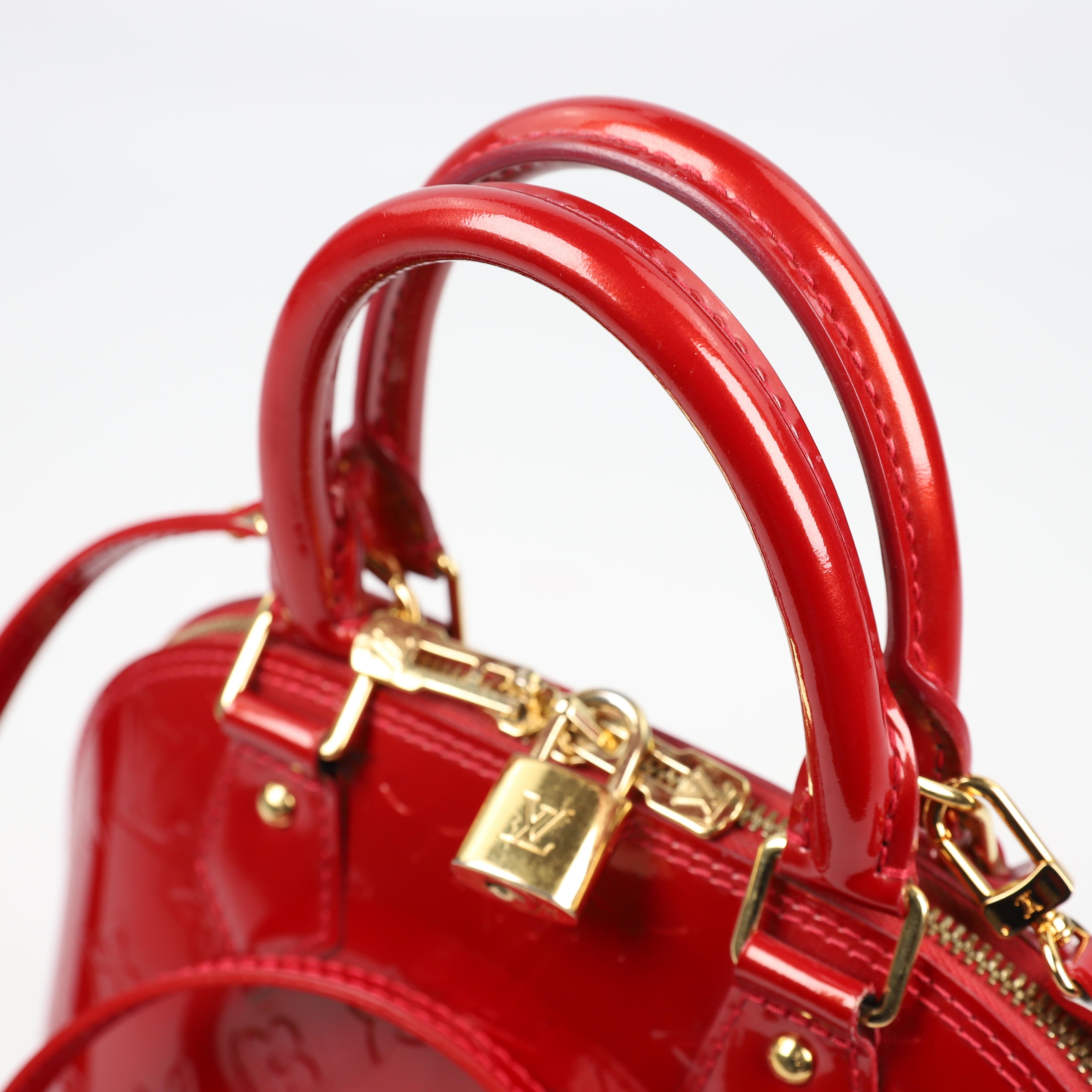 Louis Vuitton Alma BB leather handbag 11