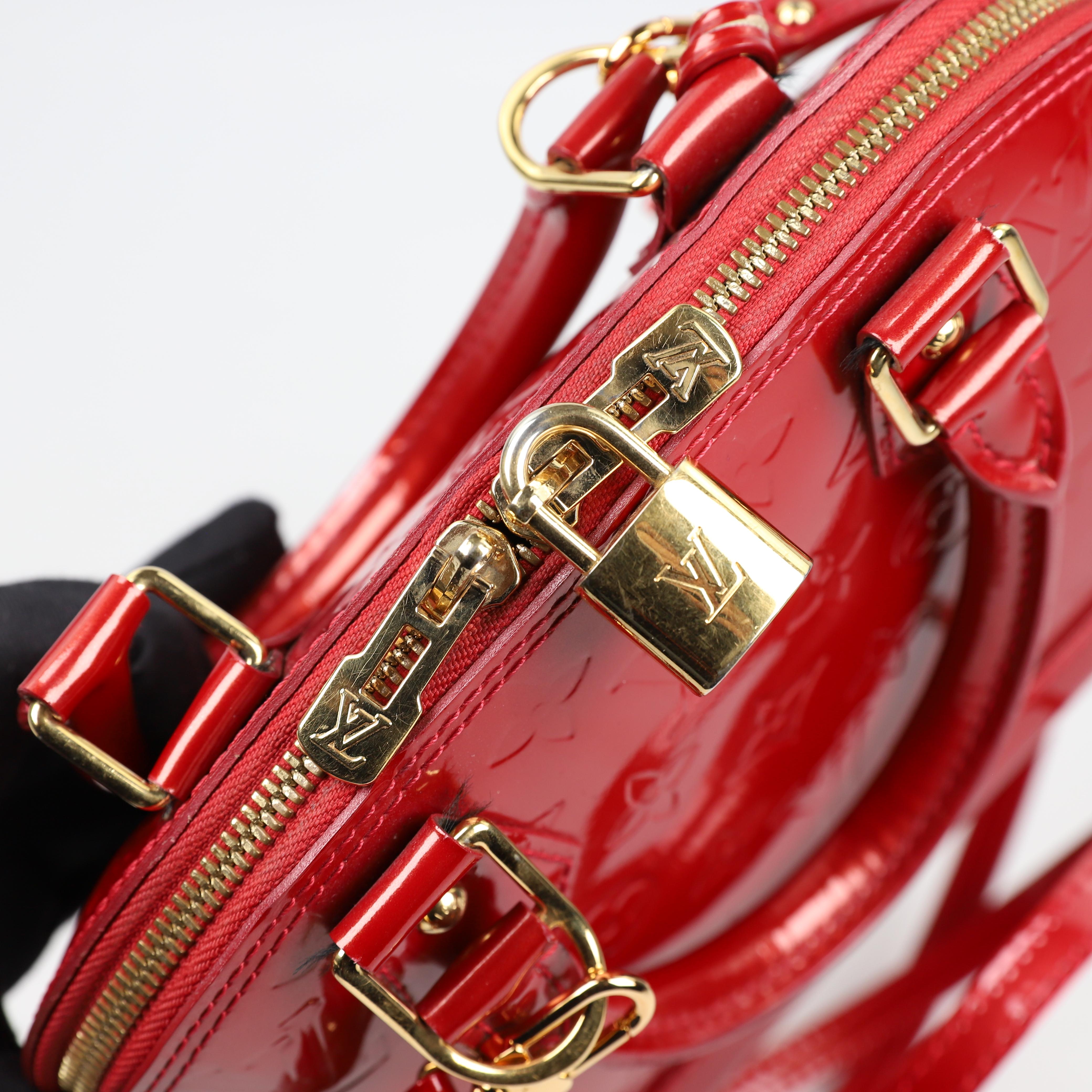 Louis Vuitton Alma BB leather handbag 12
