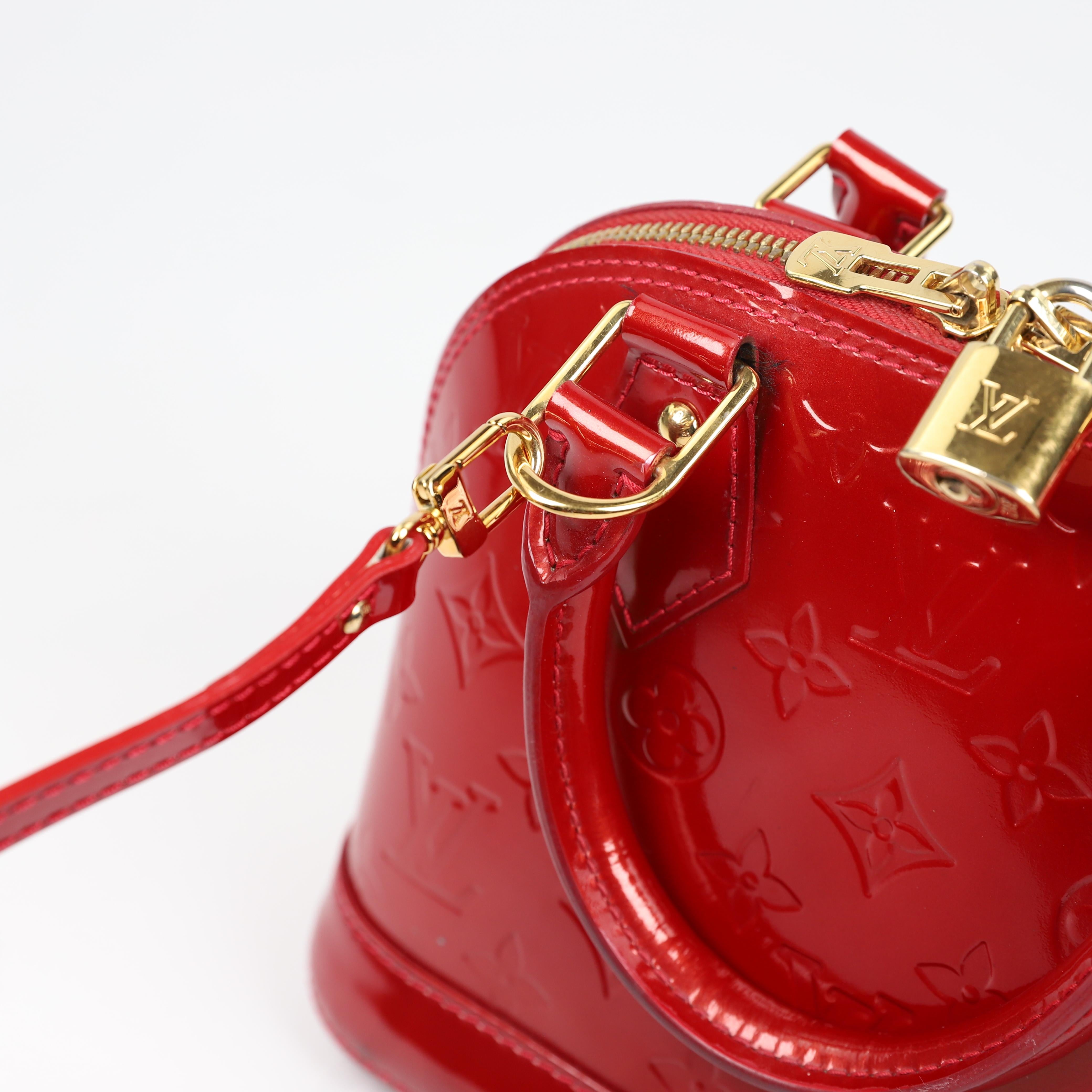 Louis Vuitton Alma BB leather handbag 13