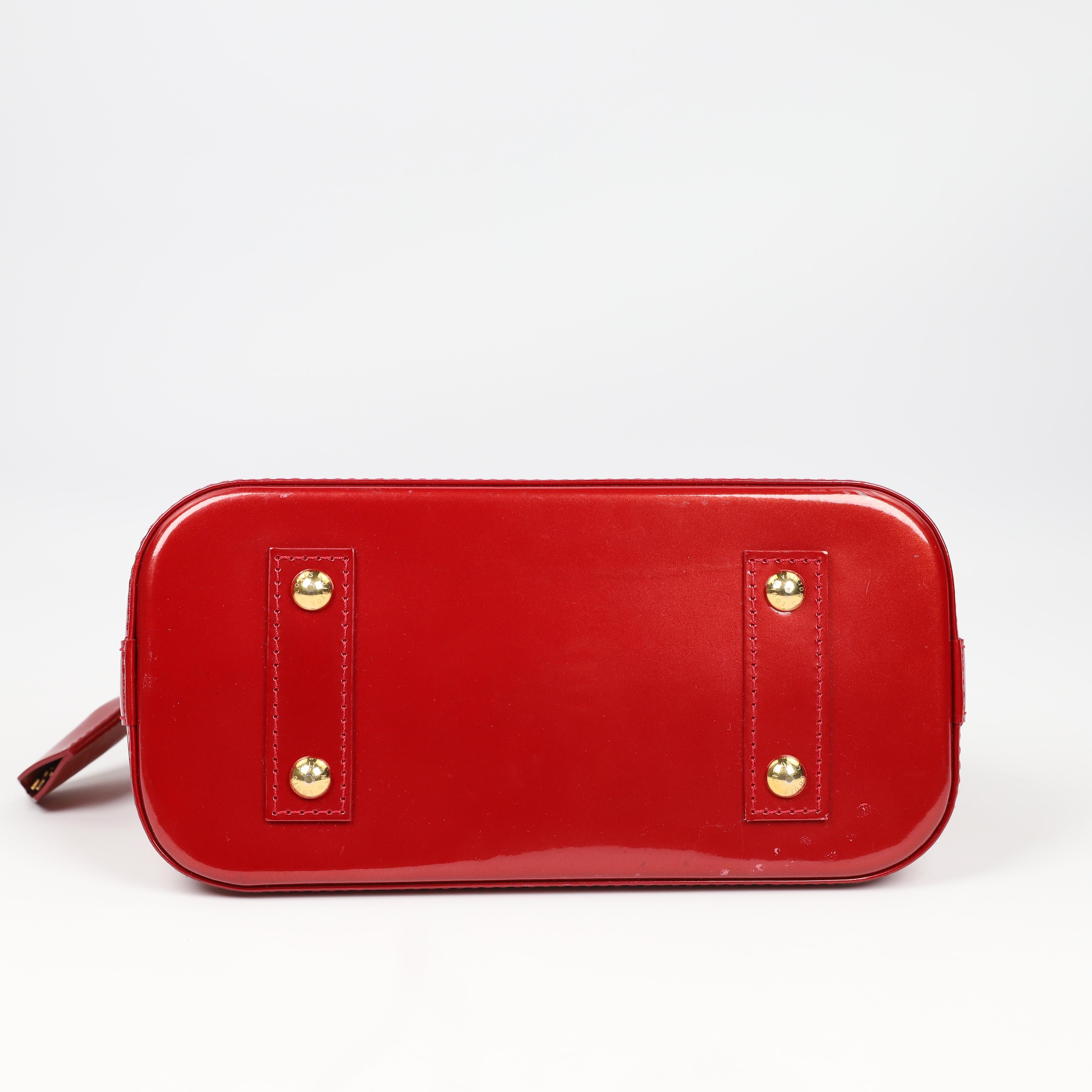 Louis Vuitton Alma BB leather handbag 4