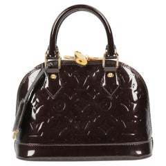 Louis Vuitton Alma BB patent leather handbag