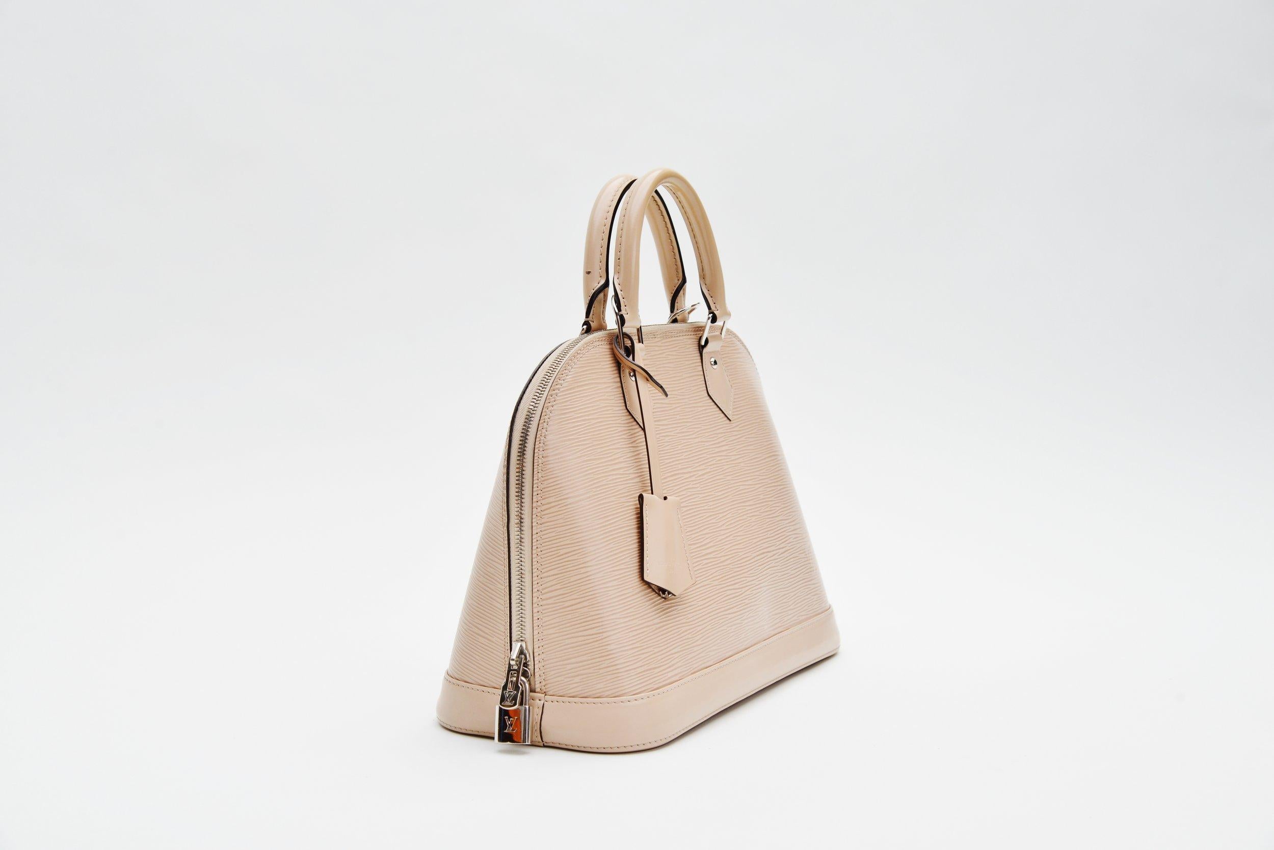 alma shaped bag