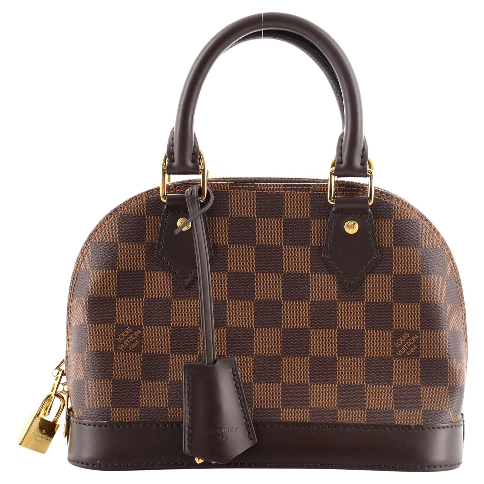 Louis Vuitton Alma PM Handbag with key clochette at 1stDibs