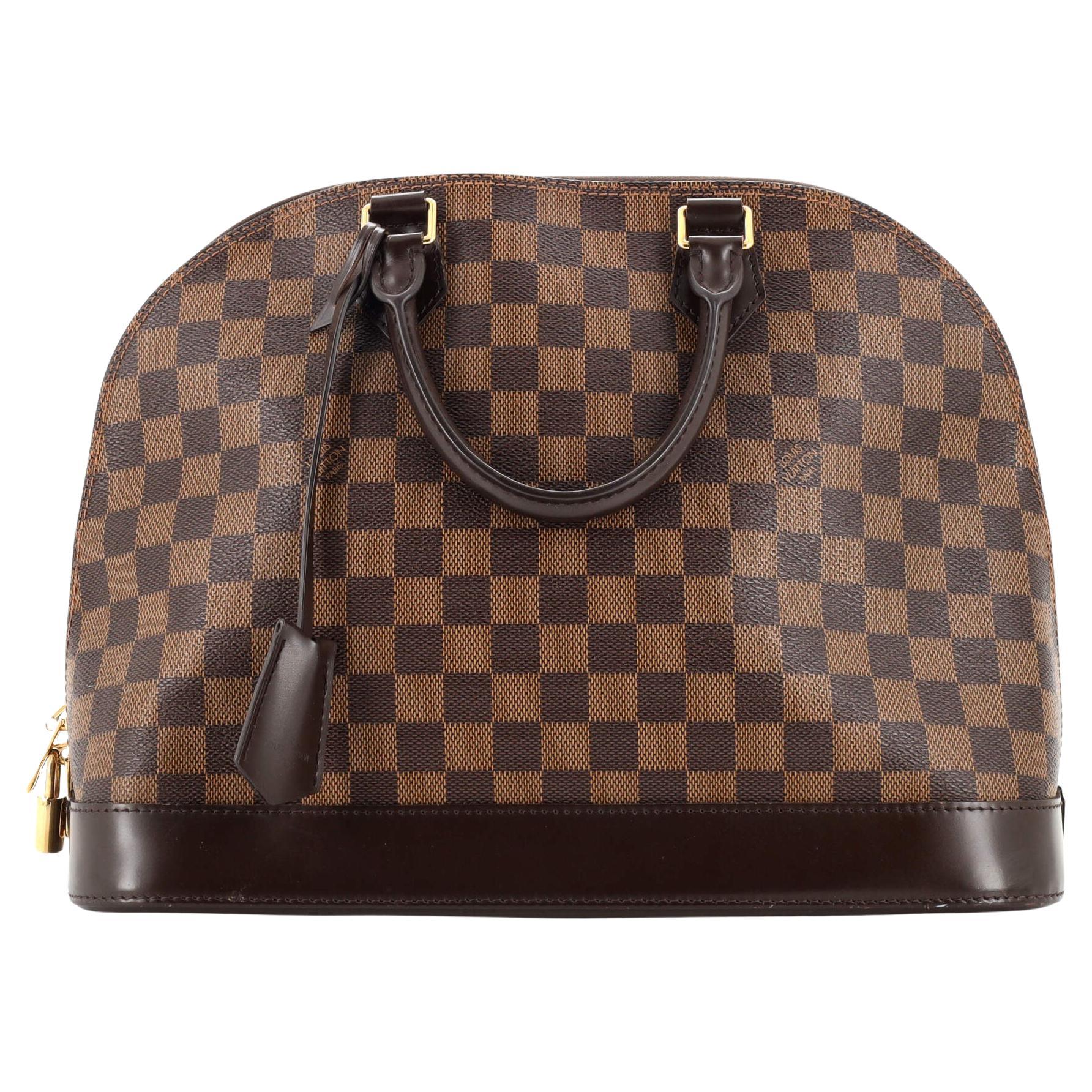 Louis Vuitton Rivoli Bag - 4 For Sale on 1stDibs