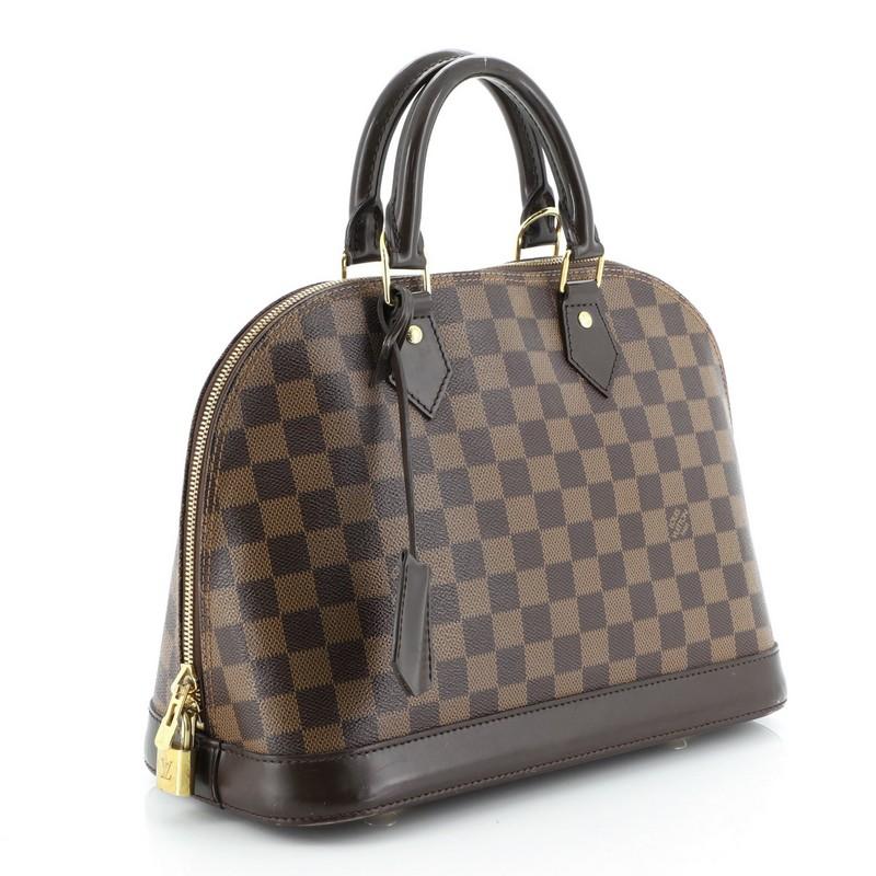 Condition: Fair. Moderate wear and peeling along base corner edges, scuffs and discoloration on base trim. Heavy loss of luster and wear on handles, moderate pen marks and stains in interior, scratches and tarnish on hardware. 
Accessories: Keys,