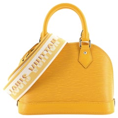 Louis Vuitton Alma, borsa in pelle Epi con cinturino in jacquard con logo BB