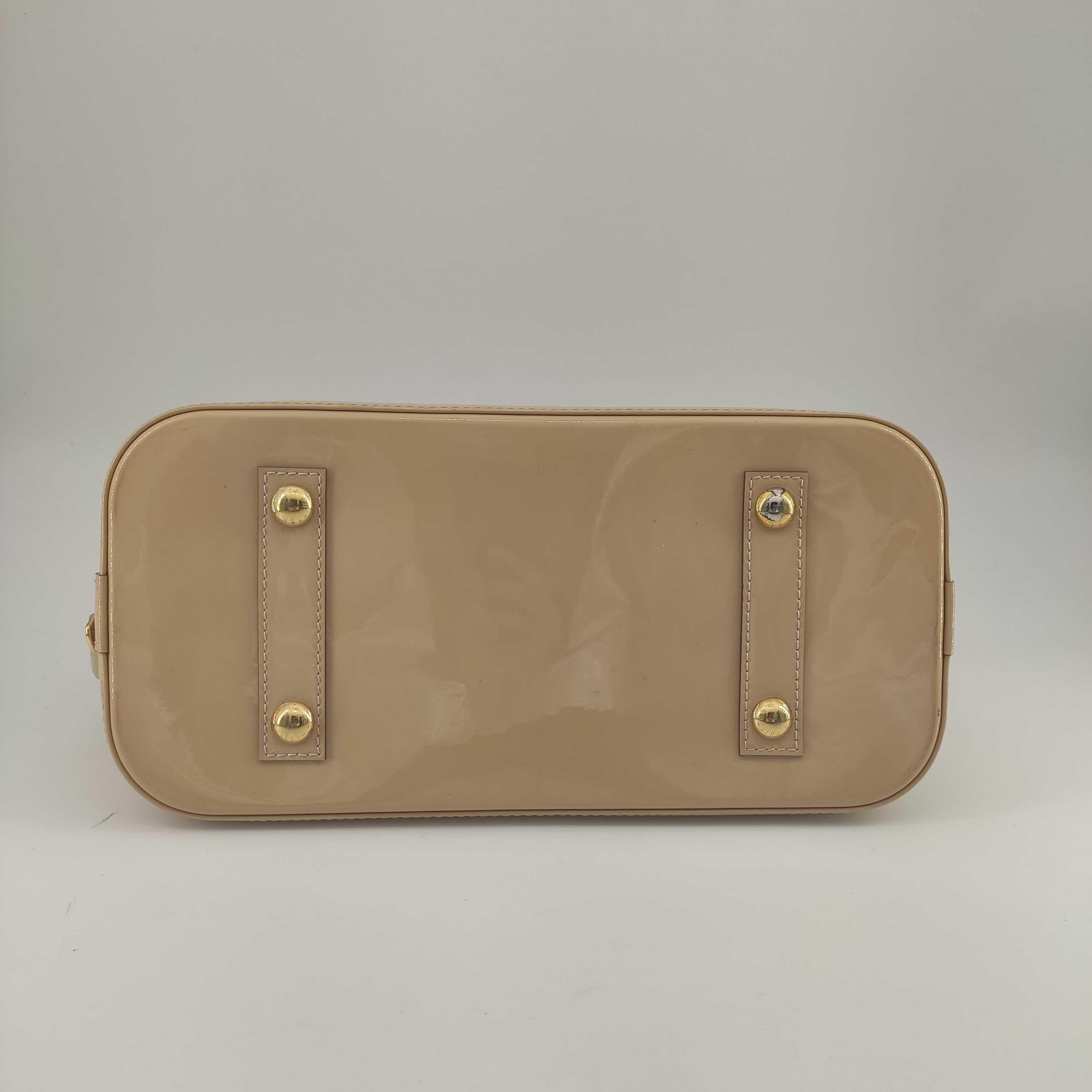 Women's LOUIS VUITTON Alma Handbag in Beige Leather