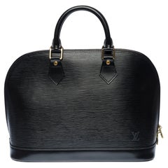 Louis Vuitton Alma handbag in black épi leather, Gold hardware