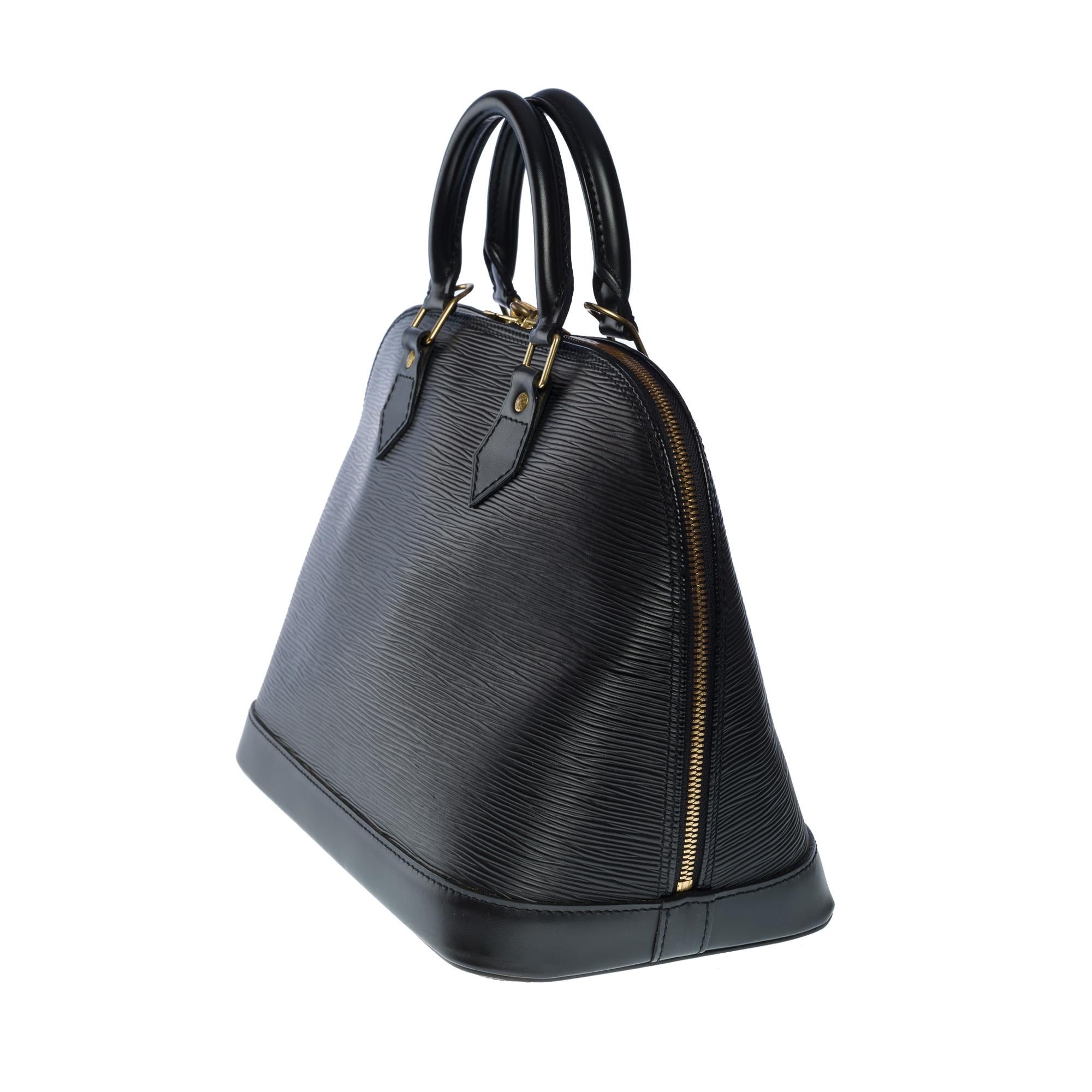 Women's Louis Vuitton Alma handbag in black épi leather with gold hardware