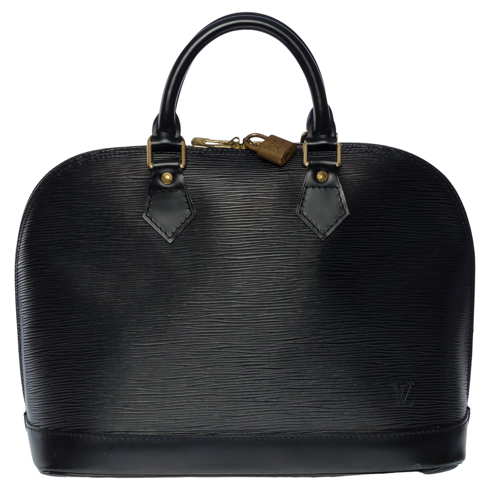 Louis Vuitton Alma handbag in black épi leather with gold hardware