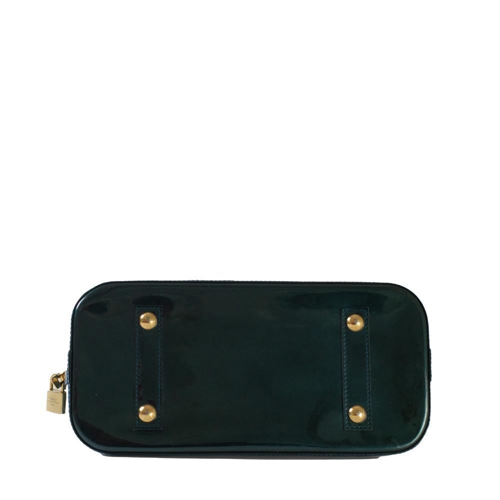 green patent handbag