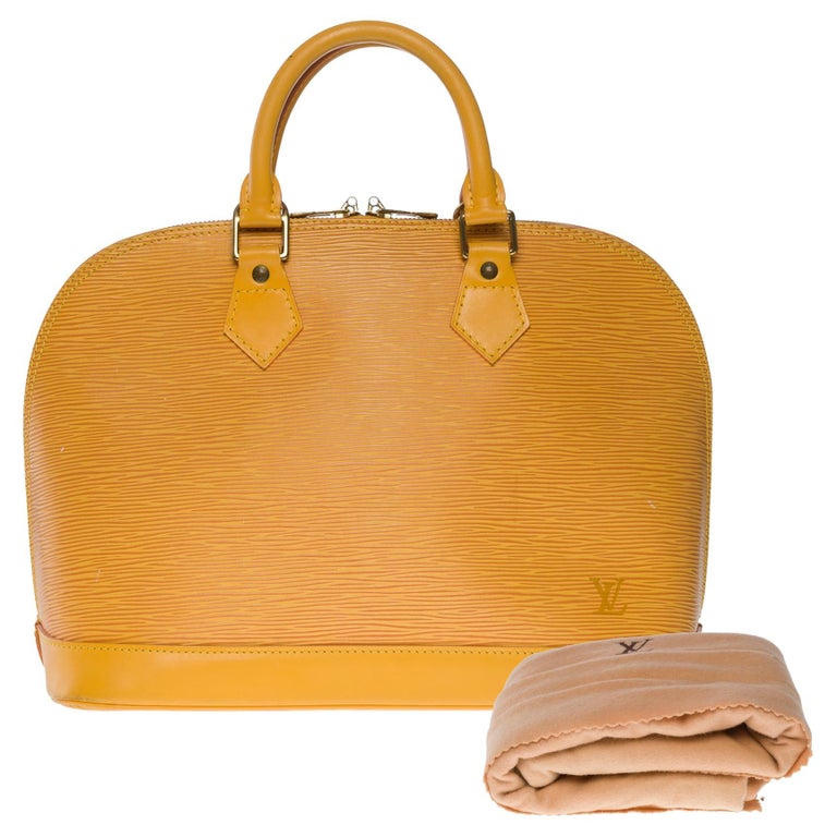 Louis Vuitton // Epi Leather Folio Shoulder Bag // Castilian Red //  Pre-Owned - Designer Handbags - Touch of Modern