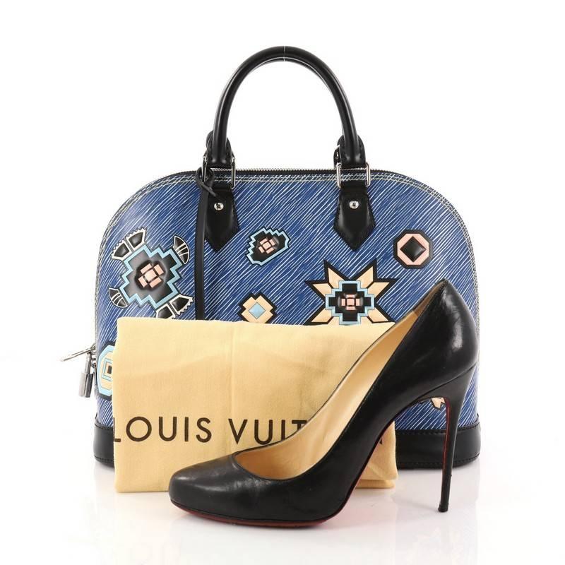 This authentic Louis Vuitton Alma Handbag Limited Edition Azteque Epi Leather PM released in the brand's Fall/Winter 2015 Collection updates its classic design with a stand-out, modern design. Constructed with Louis Vuitton's signature textured epi