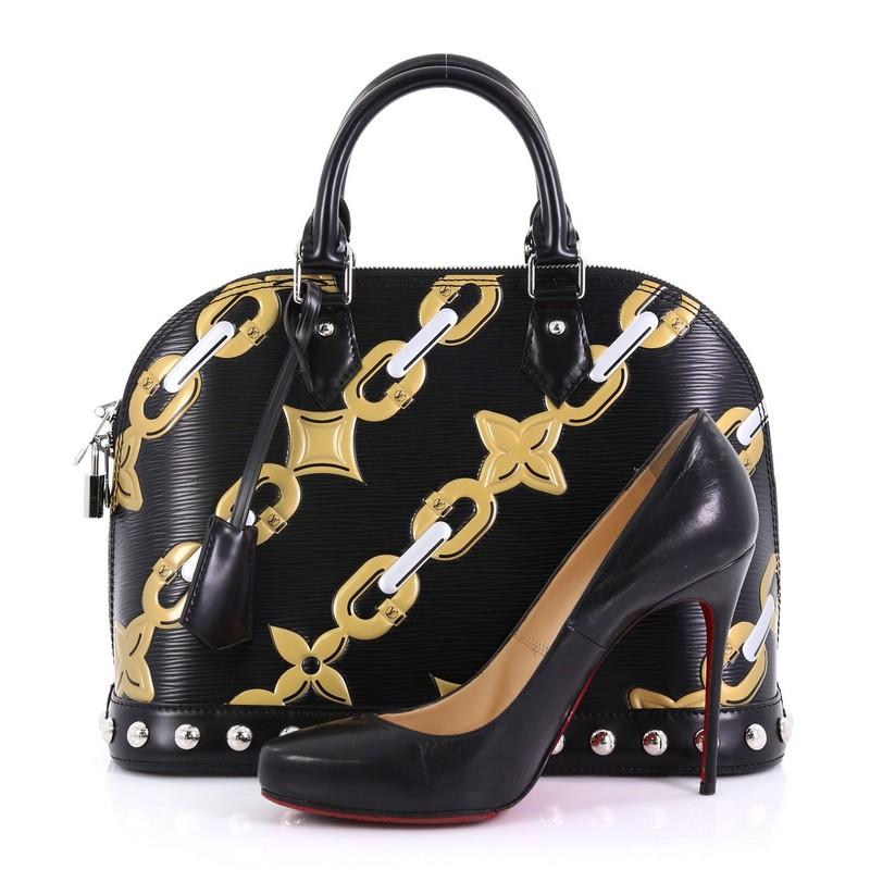 This Louis Vuitton Alma Handbag Limited Edition Chain Flower Print Epi Leather PM, crafted in black chain flower print epi leather, features dual rolled leather handles, rounded stud details, and silver-tone hardware. Its two-way zip closure opens