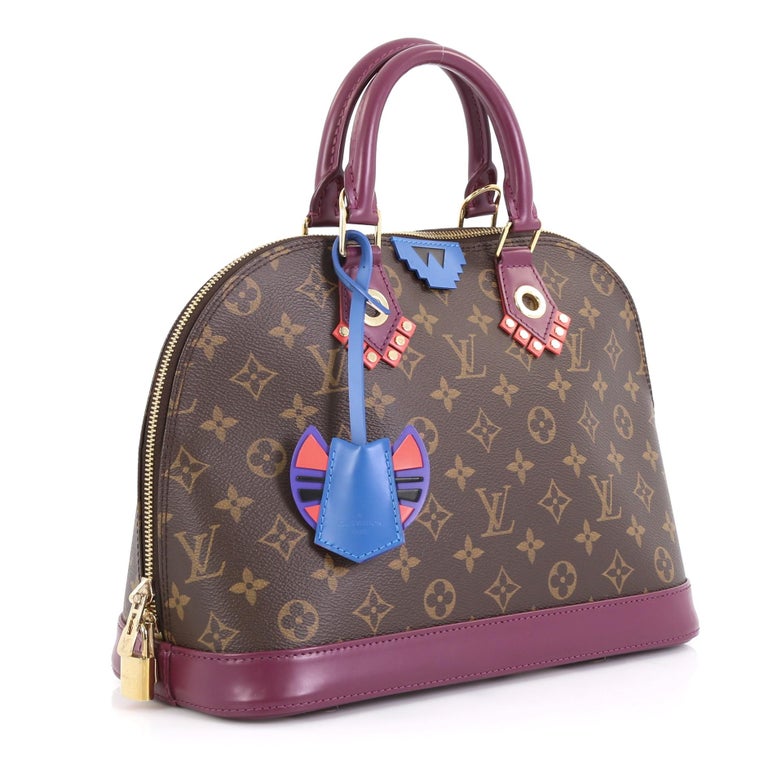 Louis Vuitton Alma Pm Handbag With Key Clochette At 1stdibs