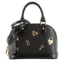 Louis Vuitton Alma Handbag Love Lock Epi Leather BB 