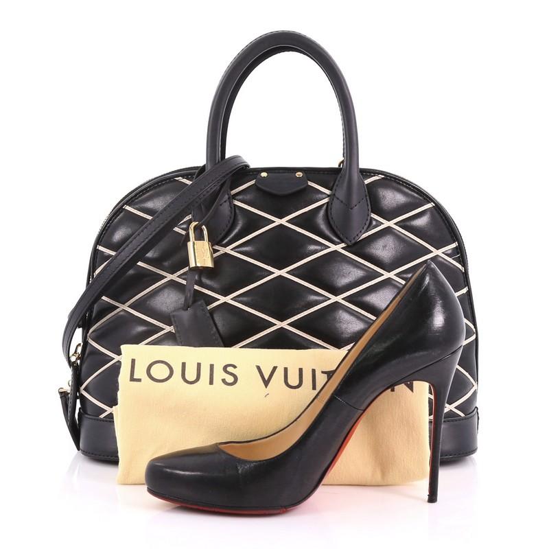 This Louis Vuitton Alma Handbag Malletage Leather PM, crafted in black leather with a white diamond quilt, features dual rolled leather handles, black leather trims, and gold-tone hardware. Its all-around zip closure opens to a black leather
