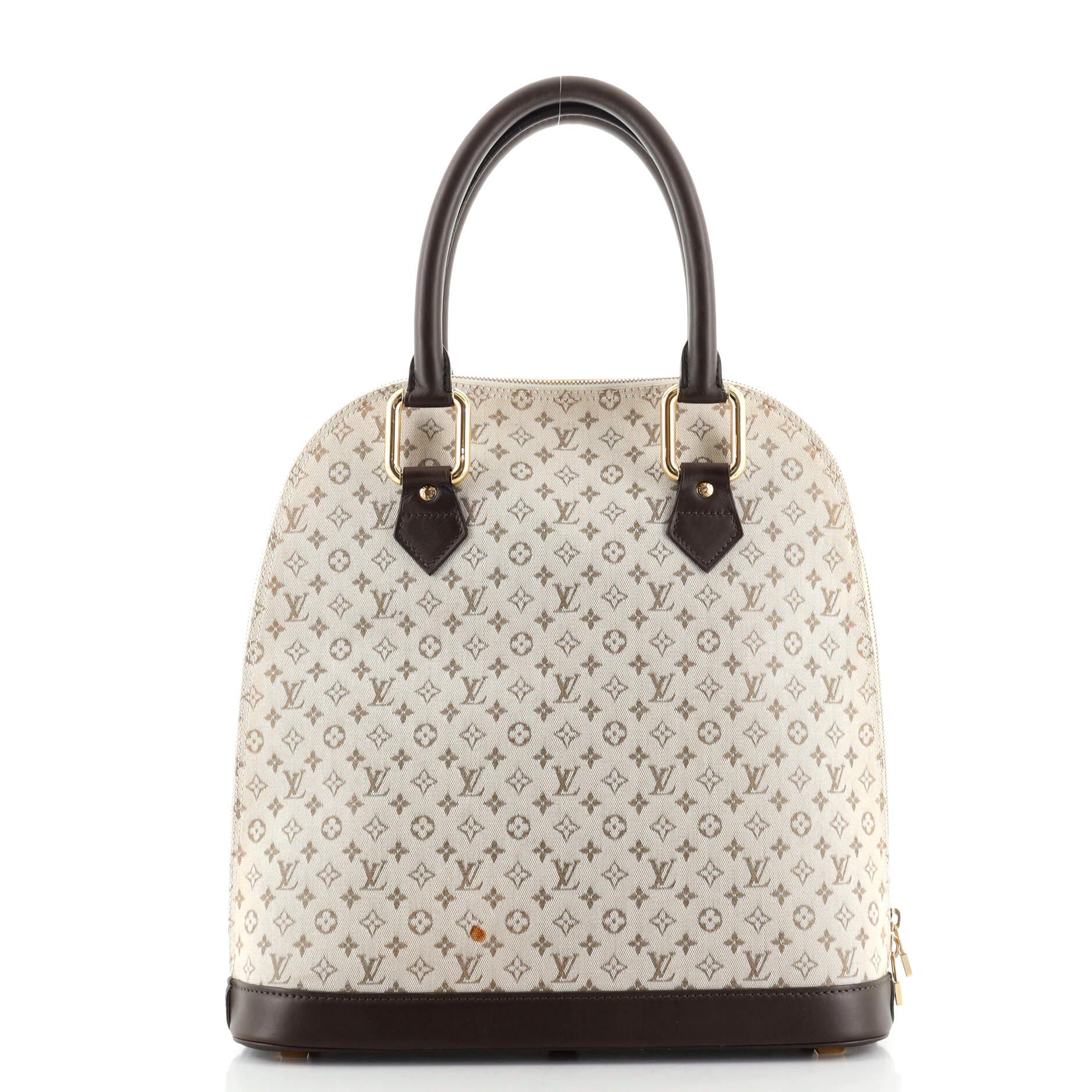 Louis Vuitton Alma Handbag Mini Lin Haut In Good Condition In NY, NY