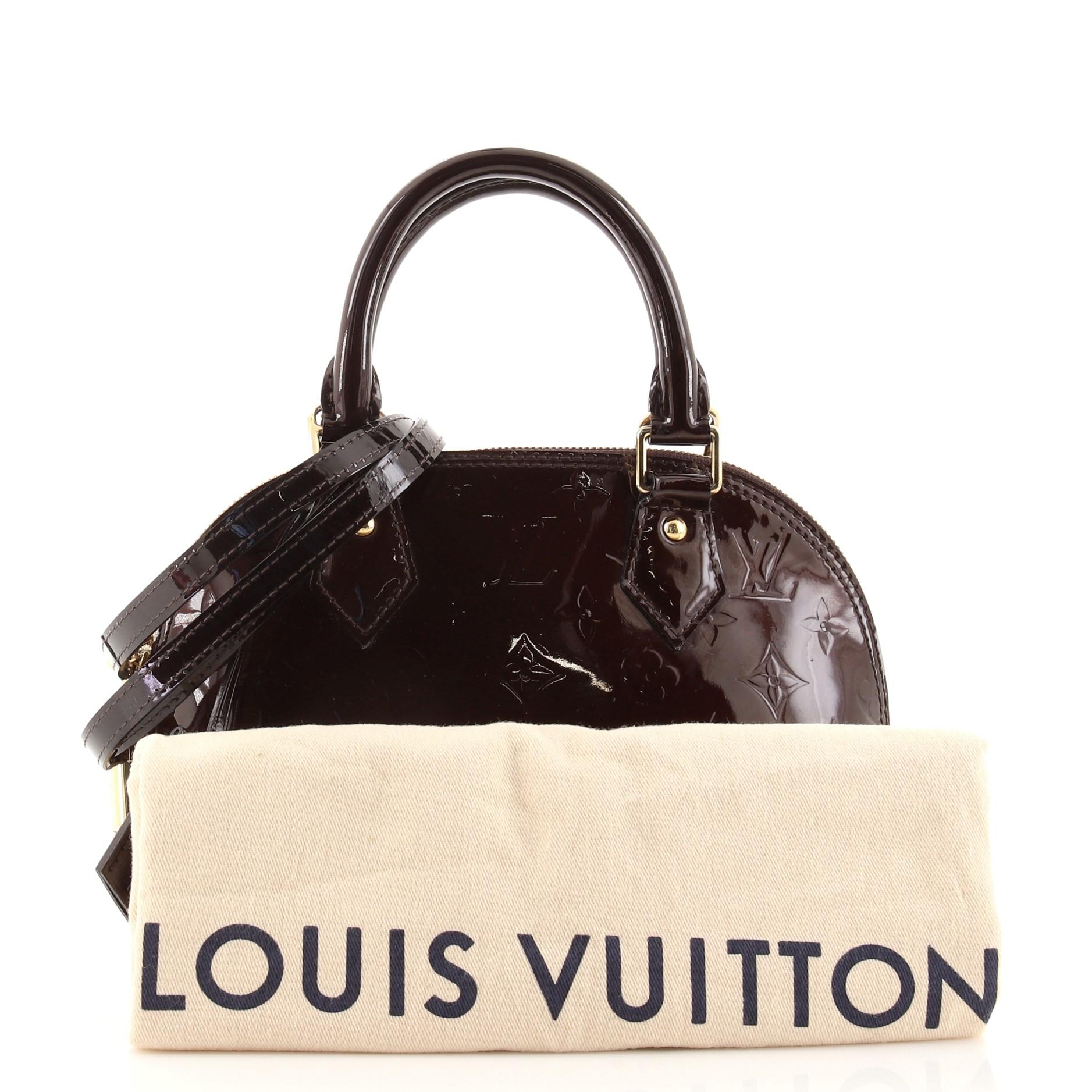 Condition: Very good. Scuffs and wear on exterior, handle and straps, marks on exterior and in interior. Creasing on strap, minor discoloration and wear in interior, scratches, tarnish and discoloration on hardware.
Accessories: Dust Bag, Clochette,