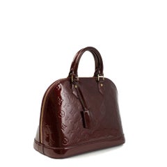 LOUIS VUITTON, Alma in burgundy patent leather