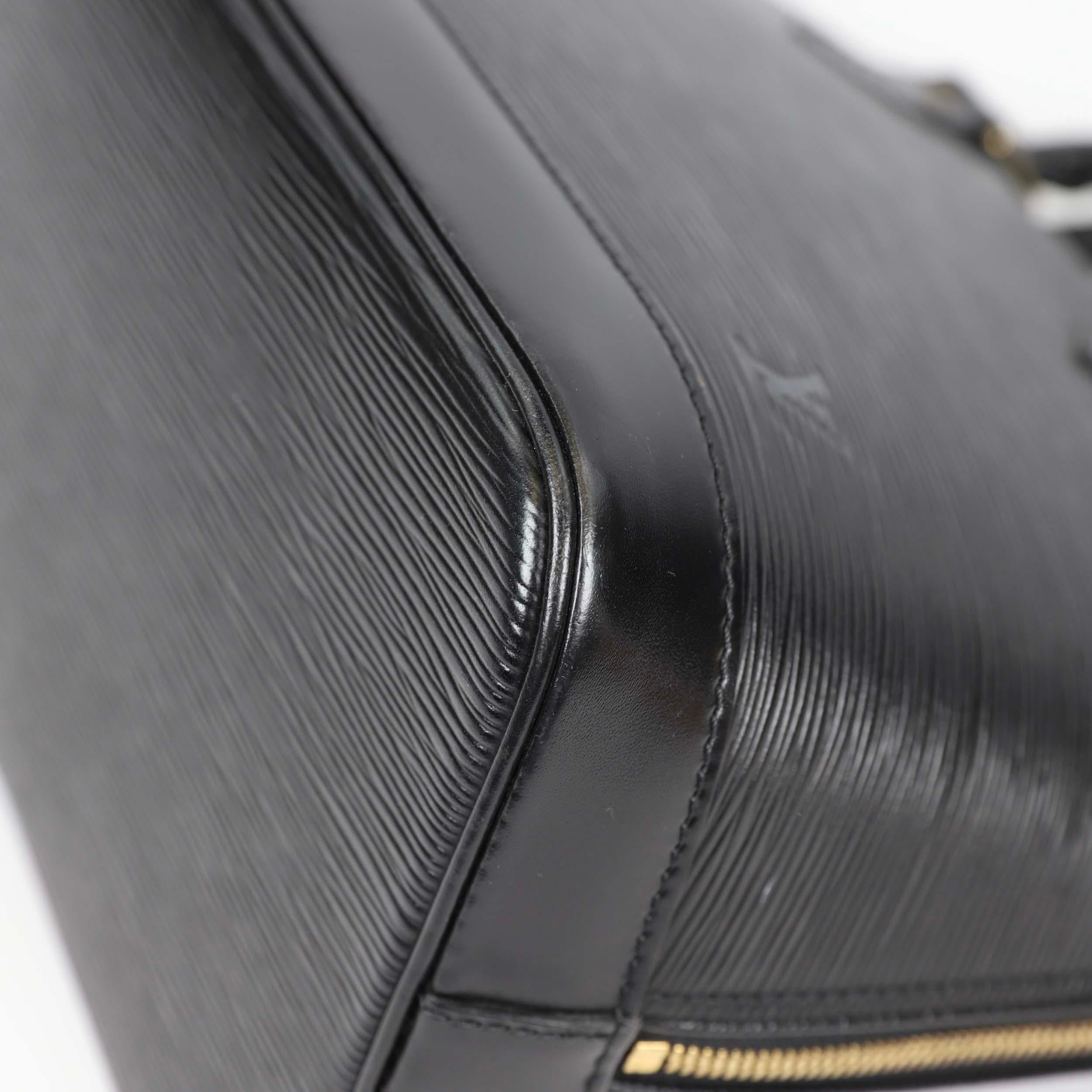 Louis Vuitton Alma leather handbag 11