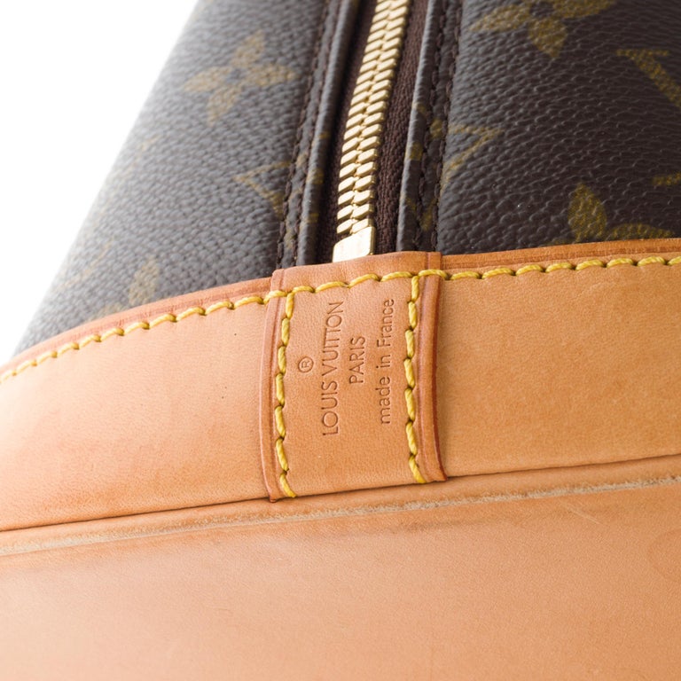 Women's Louis Vuitton Alma MM handbag with strap in brown Monogram canvas