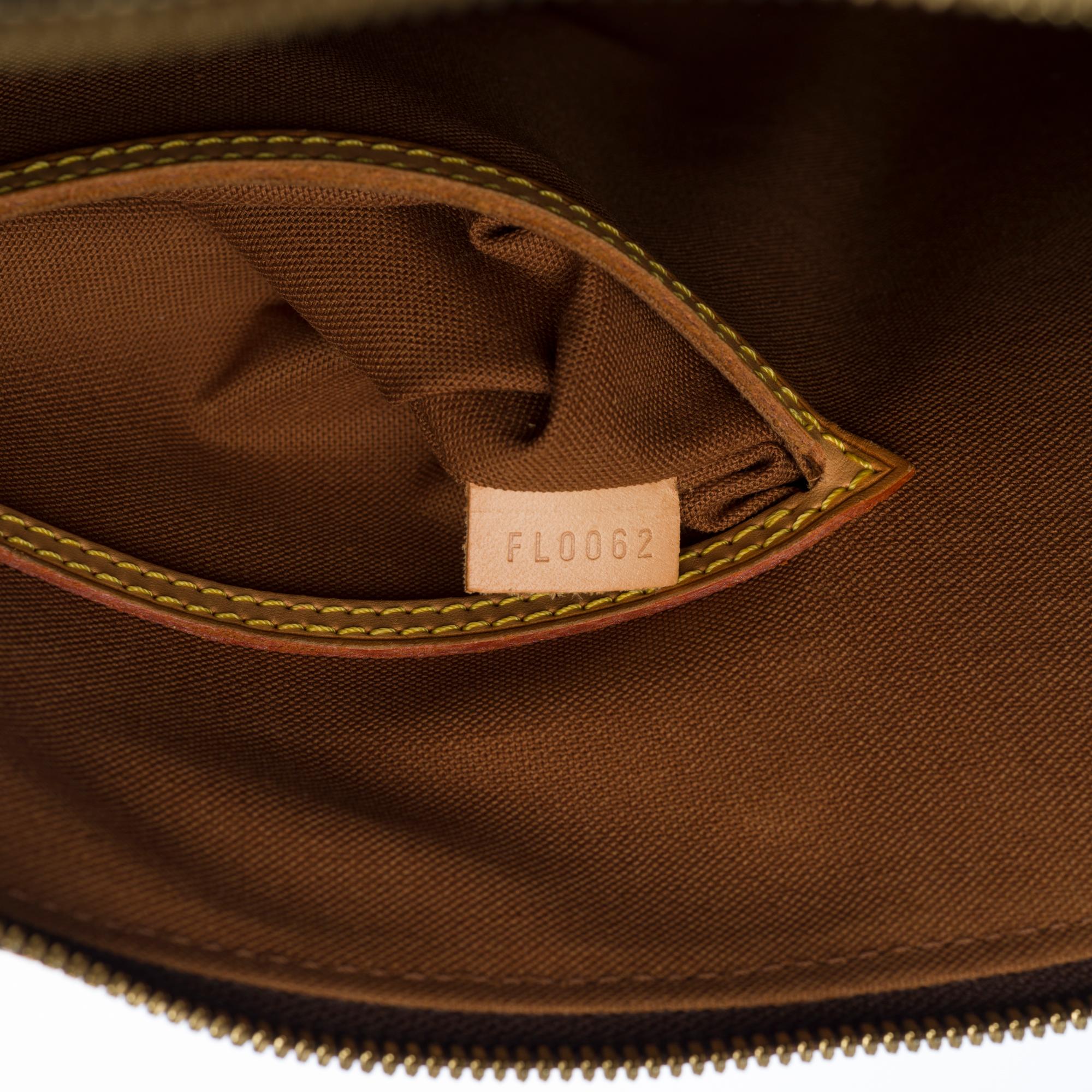 Black Louis Vuitton Alma MM handbag with strap in brown Monogram canvas