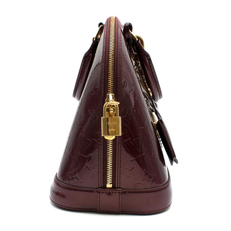 Louis Vuitton Alma PM Leather Bag W/ Tapage Charm For Sale at 1stdibs