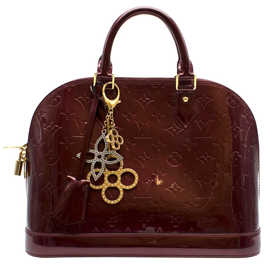 Louis Vuitton Alma PM Leather Bag W/ Tapage Charm	